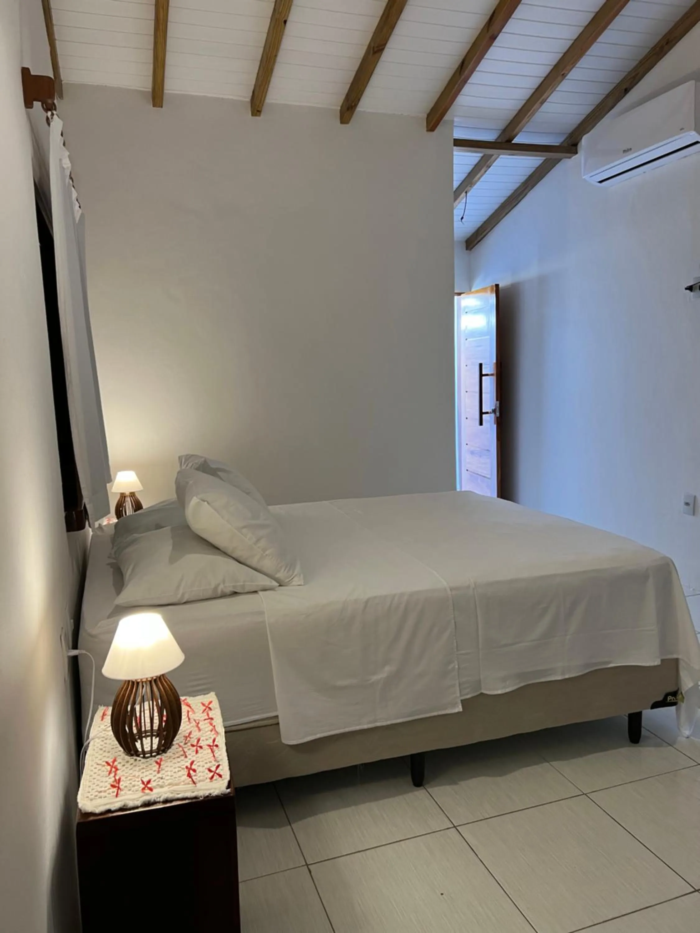 Bed in Pousada Pandoro