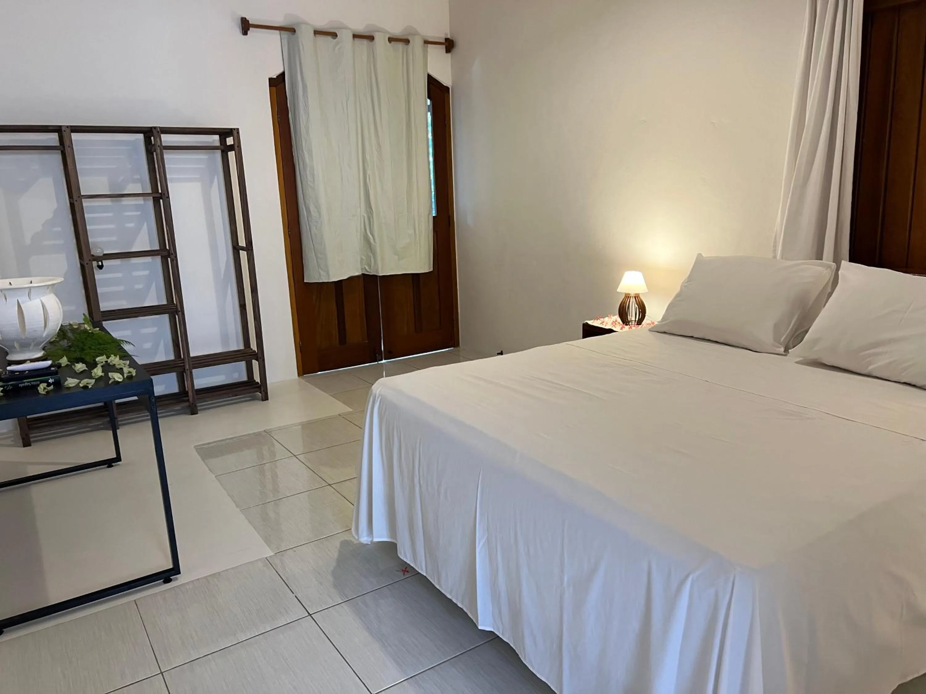 Photo of the whole room, Bed in Pousada Pandoro