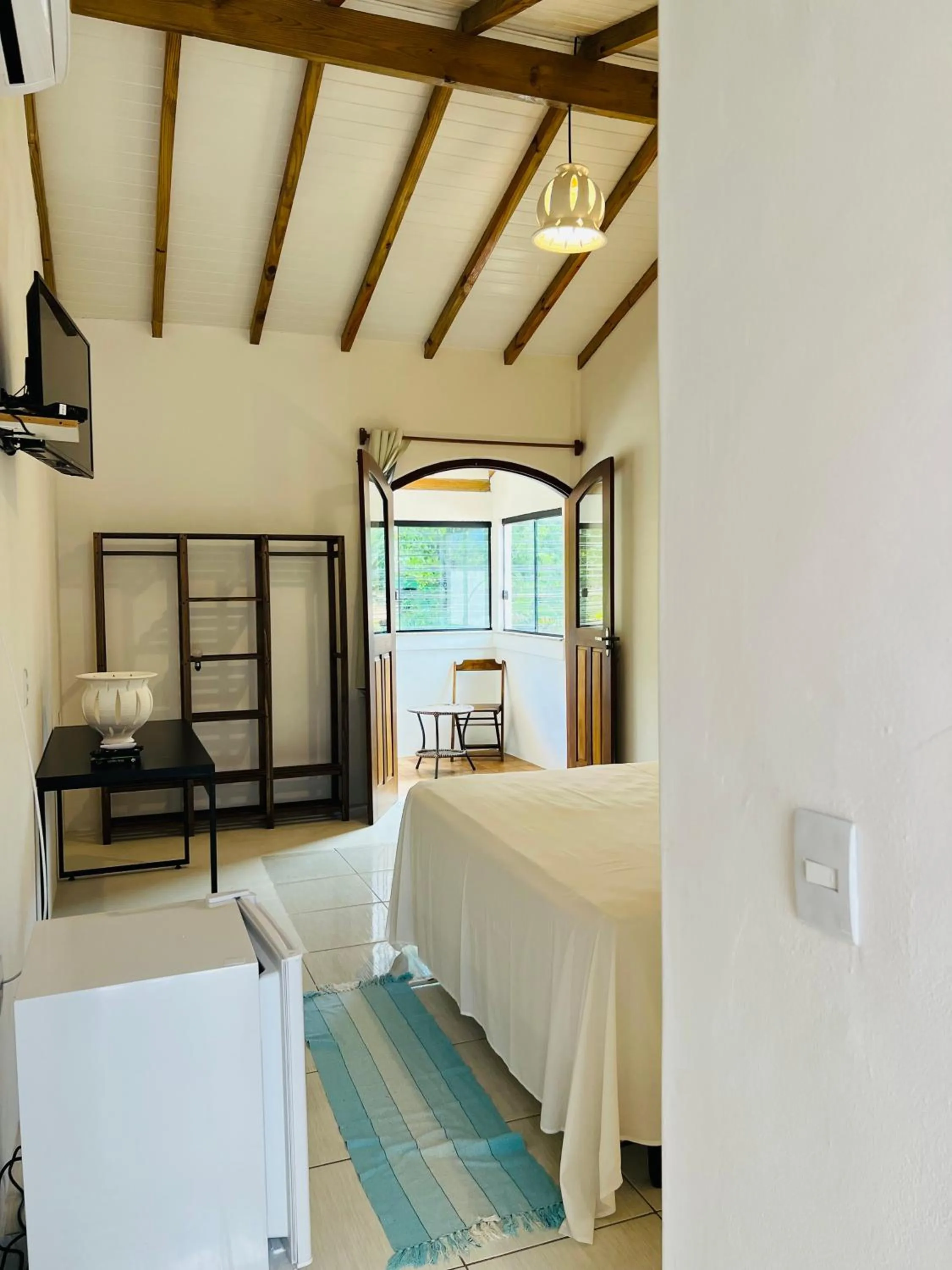 Photo of the whole room, Bed in Pousada Pandoro