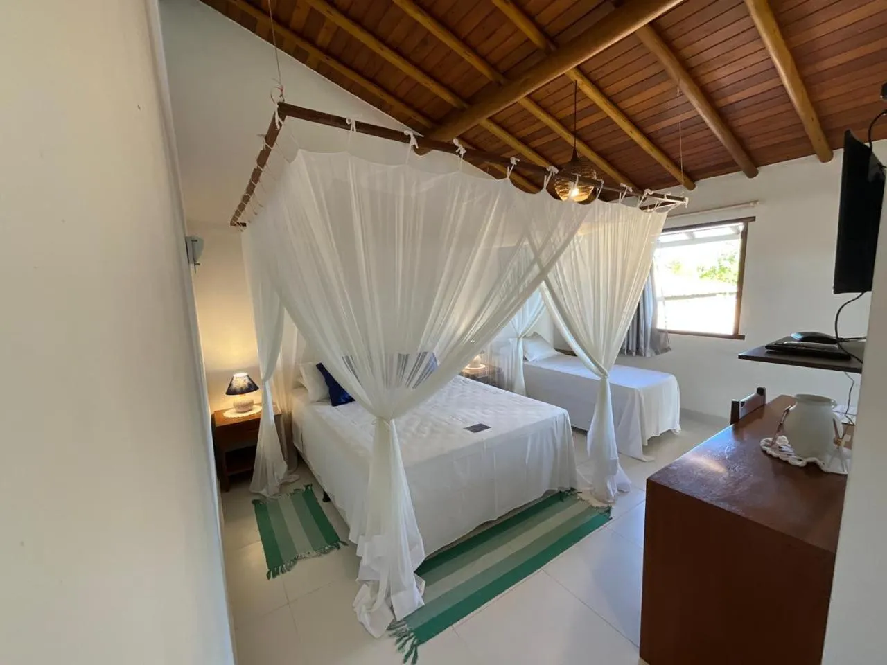 Bed in Pousada Pandoro