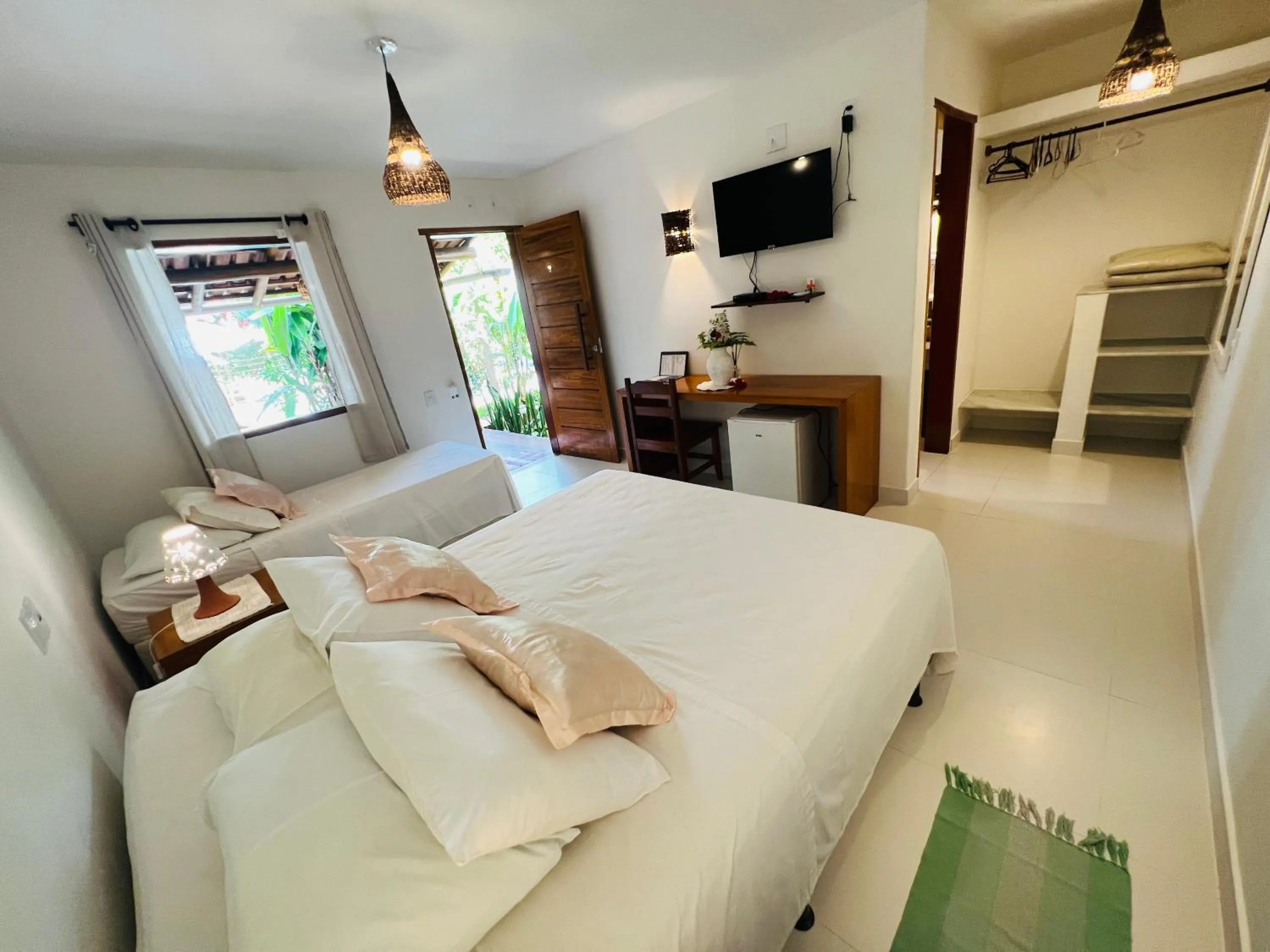 Bed in Pousada Pandoro