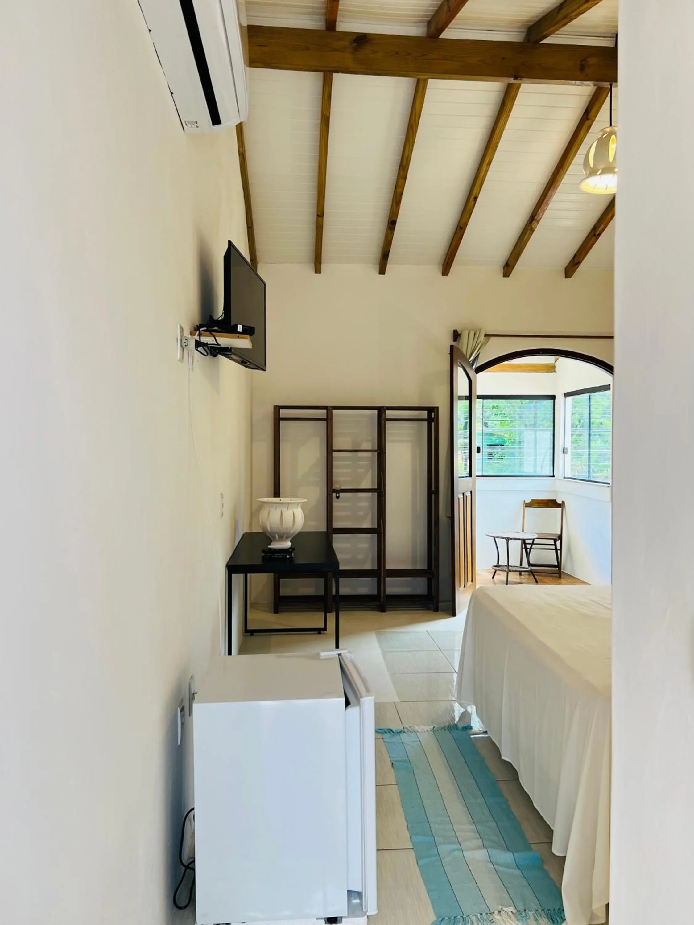 Photo of the whole room, Bed in Pousada Pandoro