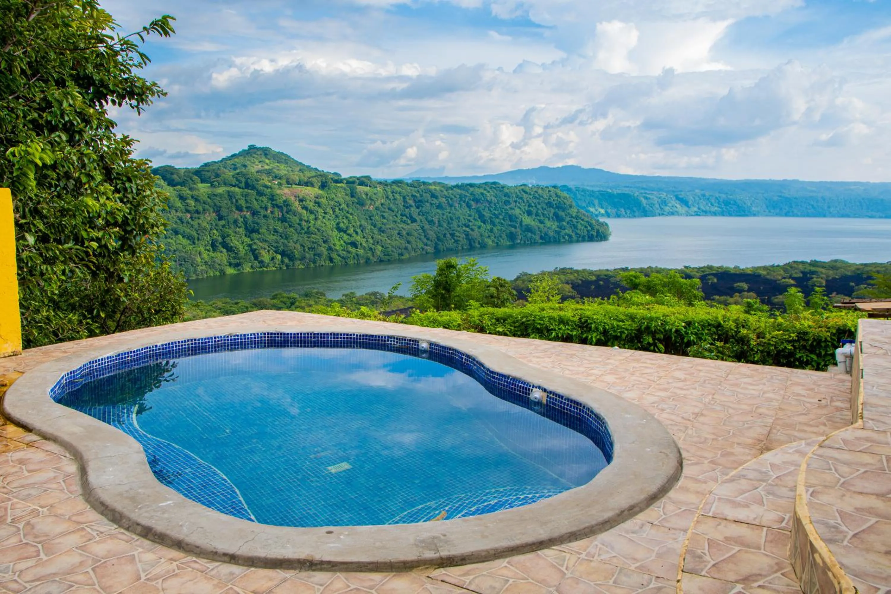 Pool view in Las Cabañas Encantadas de Nindirí
