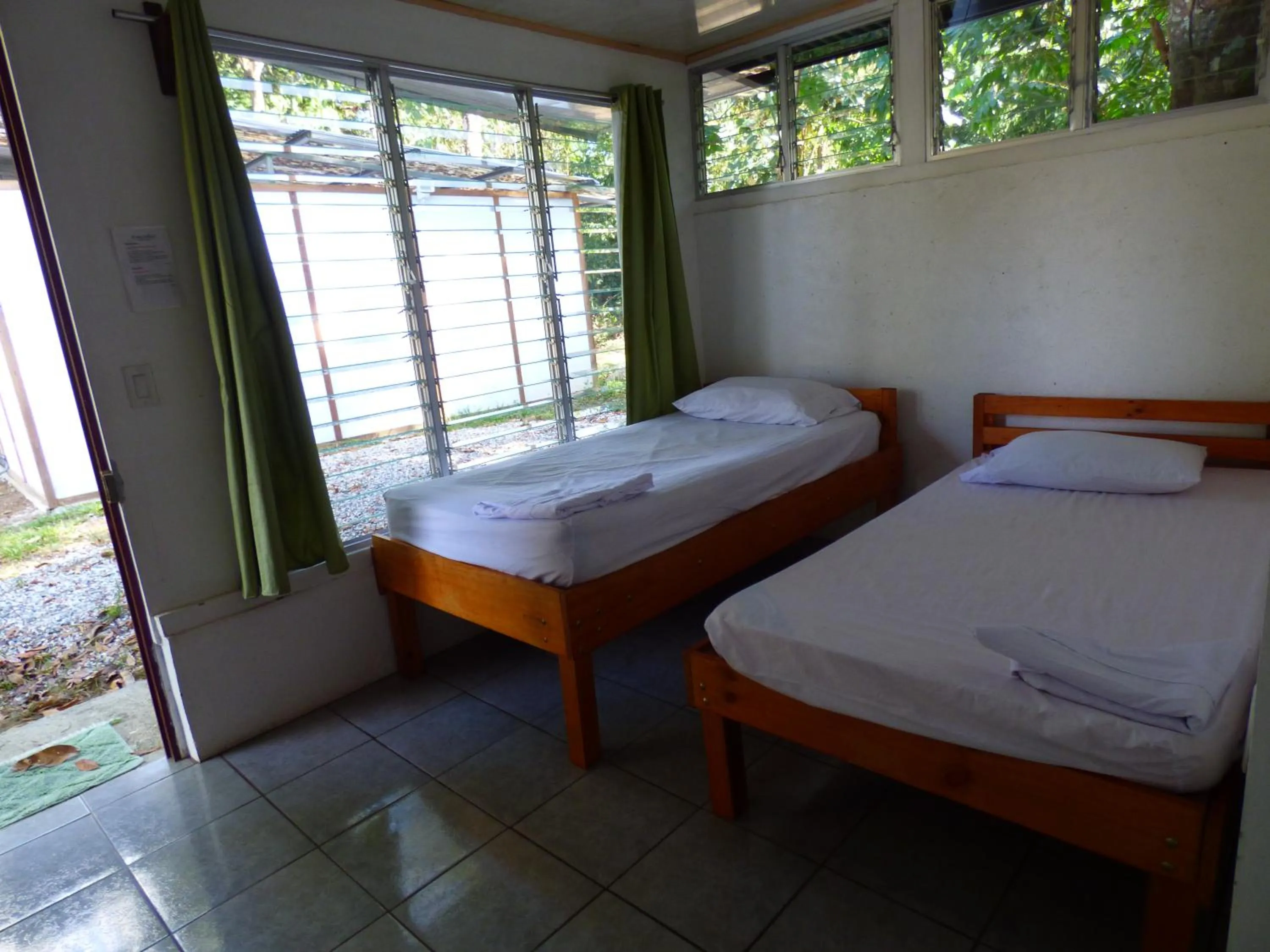 Photo of the whole room, Bed in Corcovado Beach Lodge