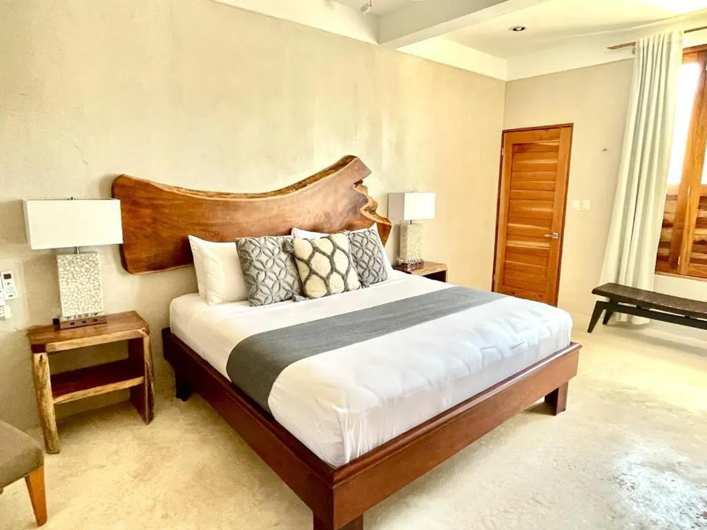 Bed in Holbox Deluxe Apartments