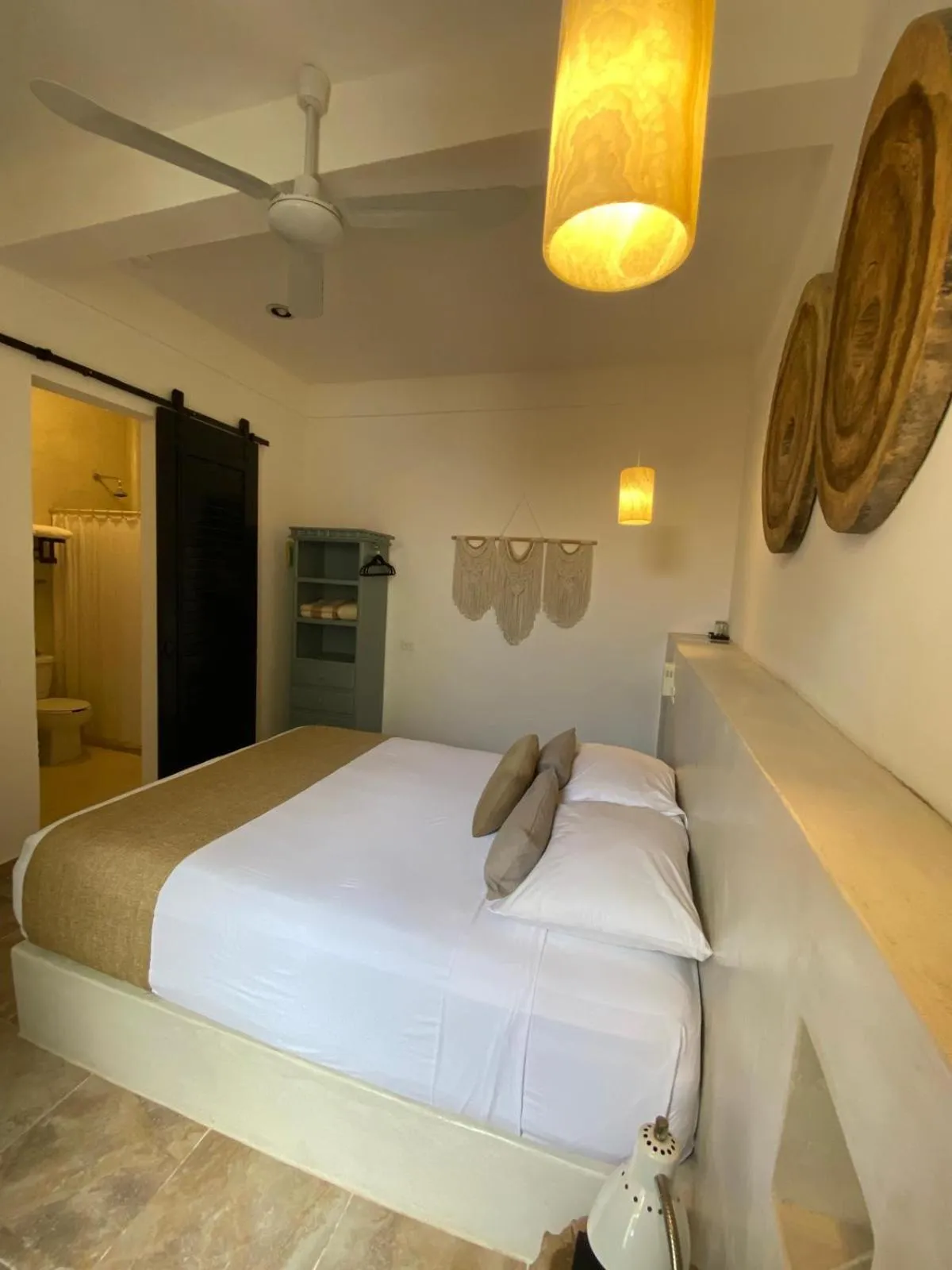 Bed in Holbox Deluxe Apartments