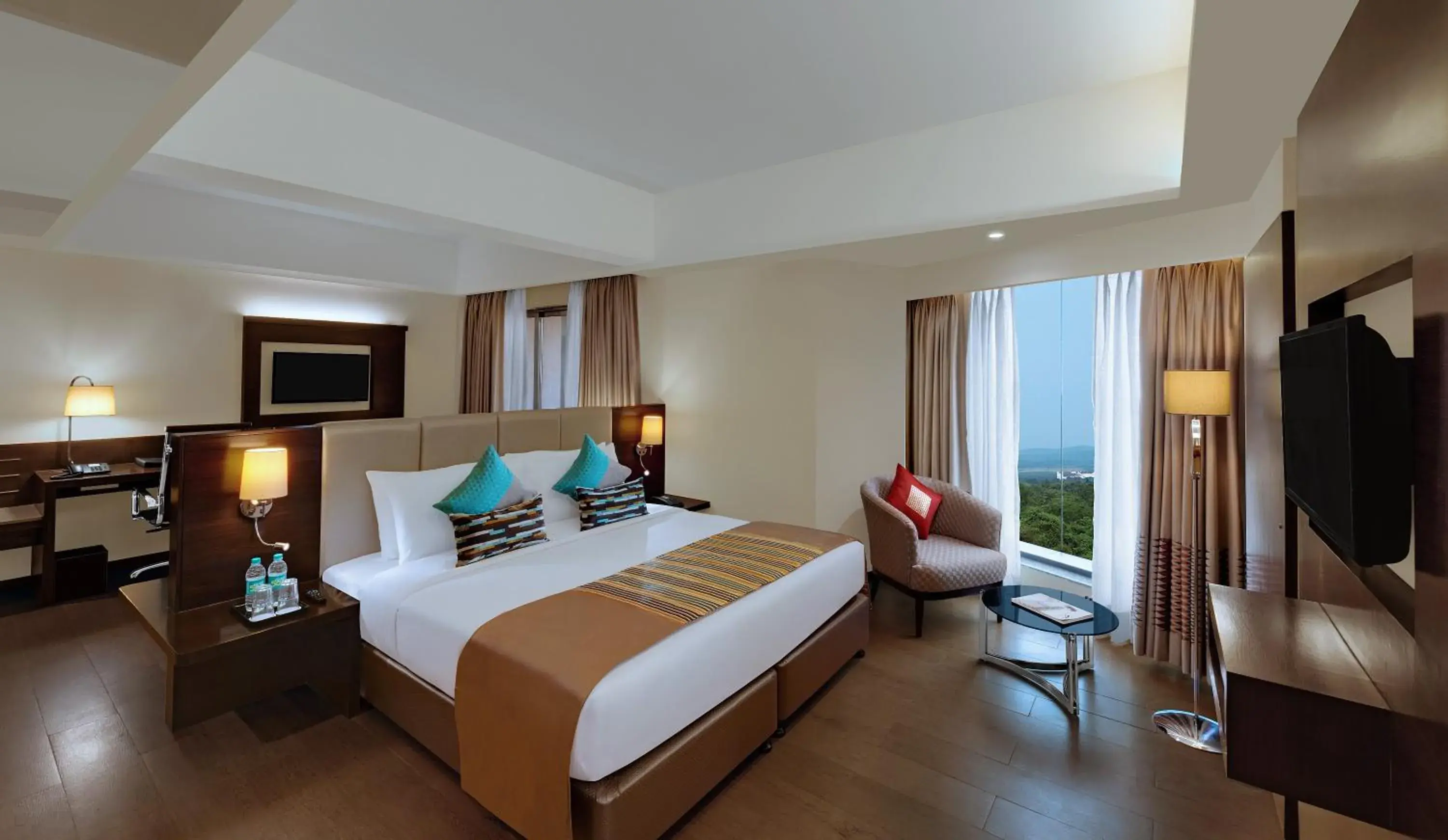 TV and multimedia, Bed in The Fern Kadamba Hotel And Spa TV and multimedia, Bed in The Fern Kadamba Hotel And Spa