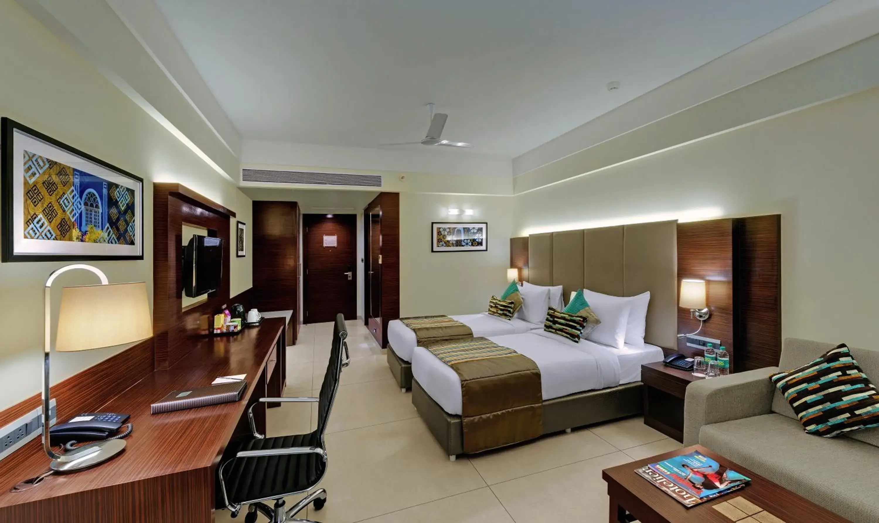 Seating area, Bed in The Fern Kadamba Hotel And Spa Seating area, Bed in The Fern Kadamba Hotel And Spa