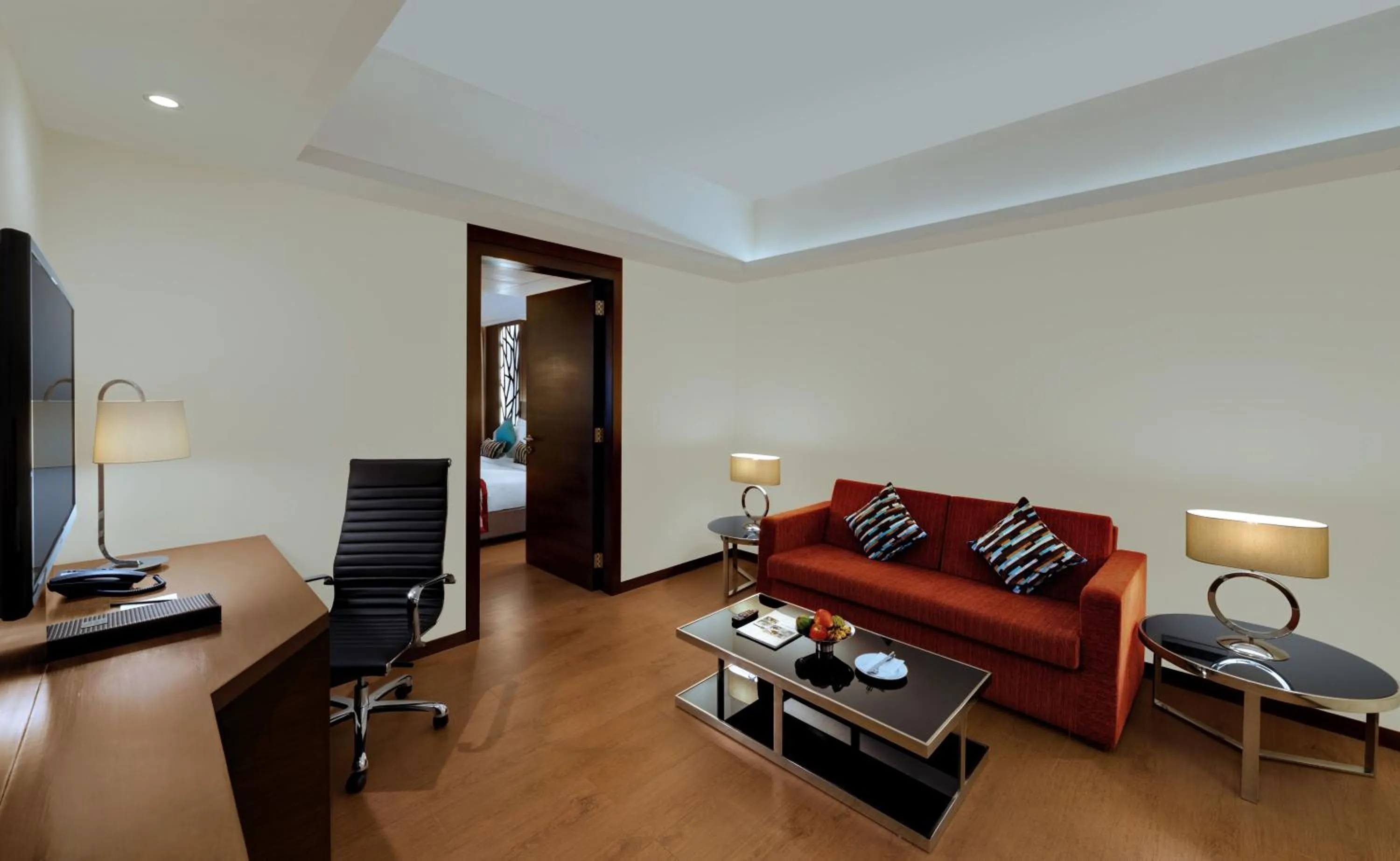 Living room, Bed in The Fern Kadamba Hotel And Spa