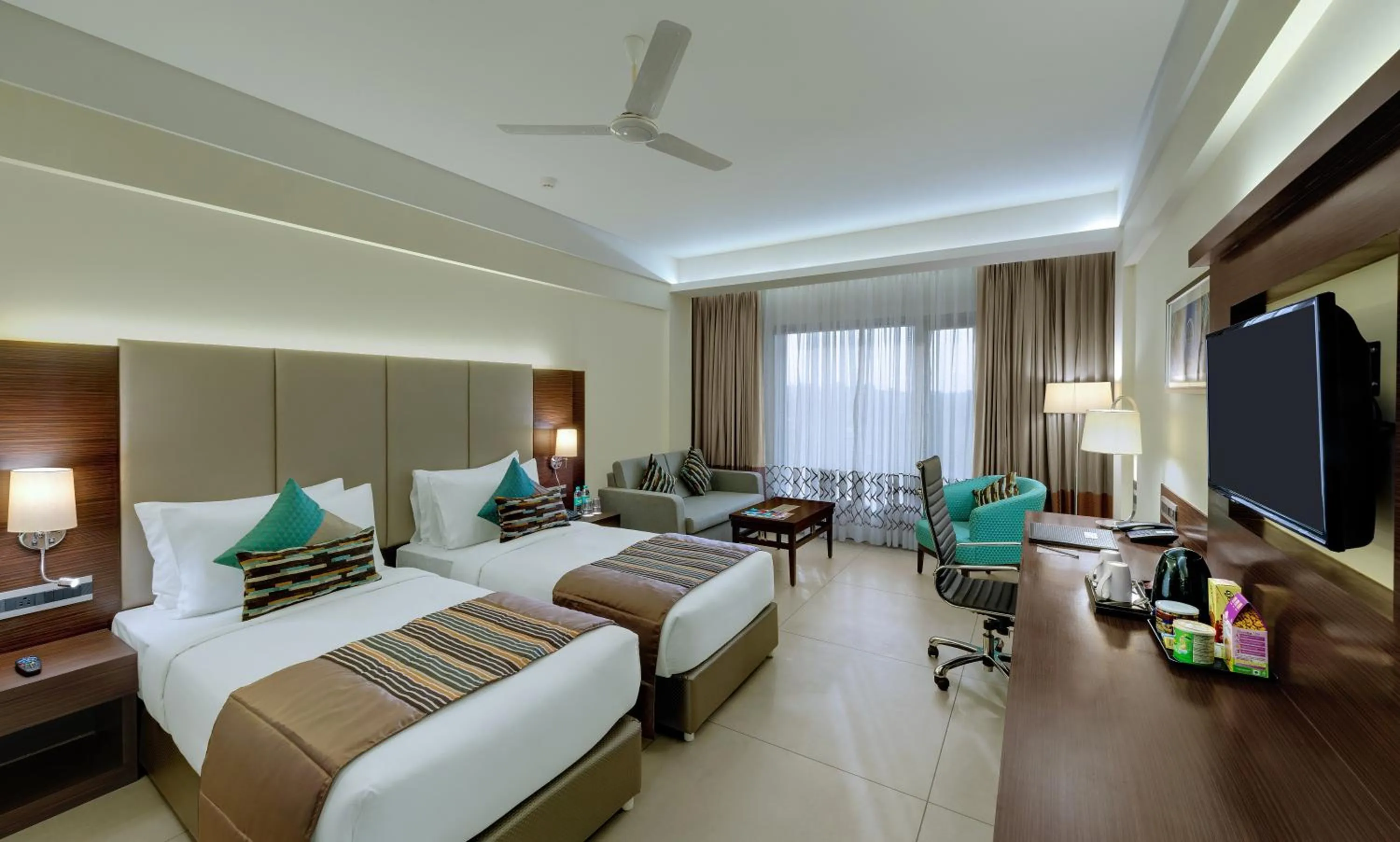 TV and multimedia, Bed in The Fern Kadamba Hotel And Spa