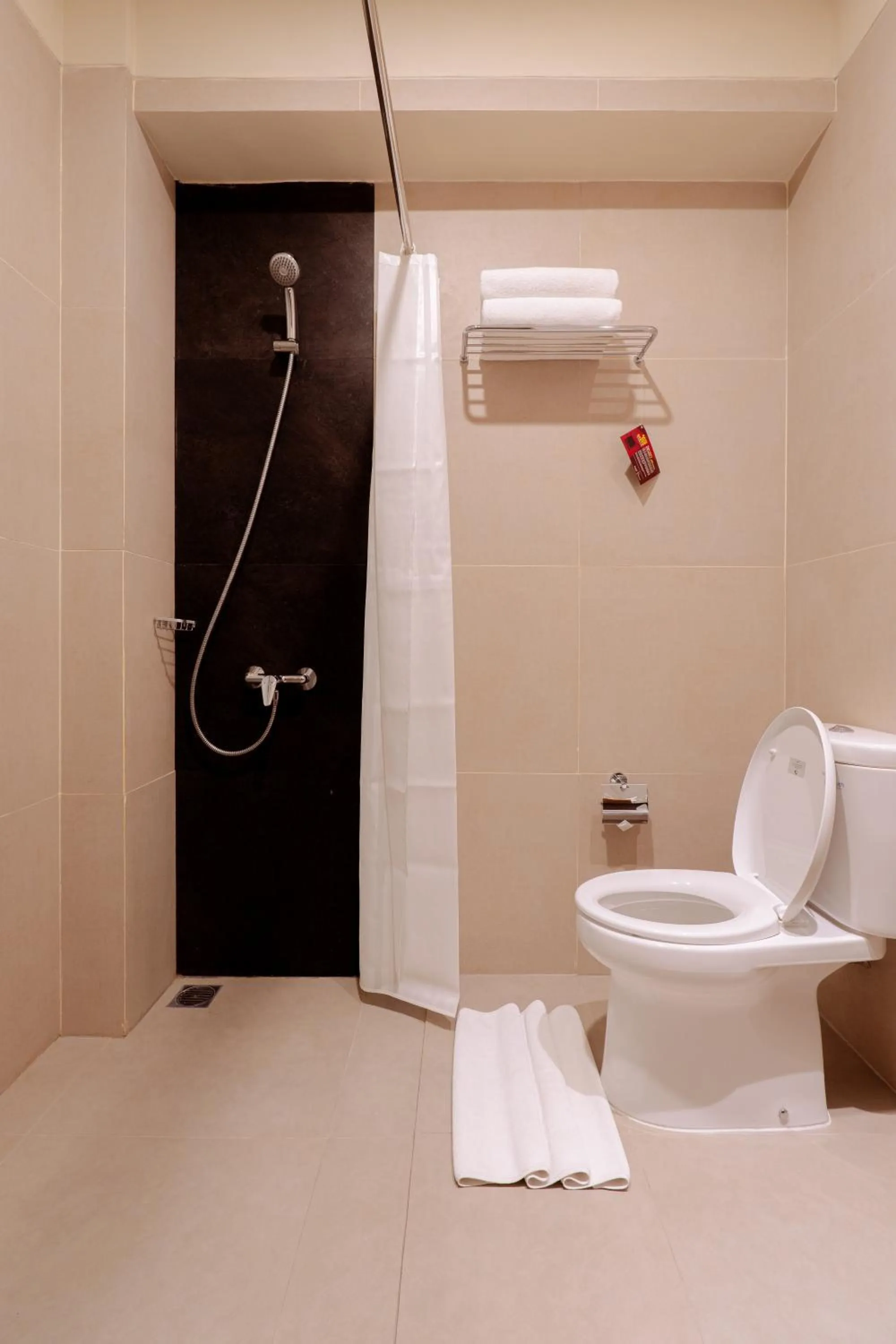 Shower in The Evitel Resort Ubud