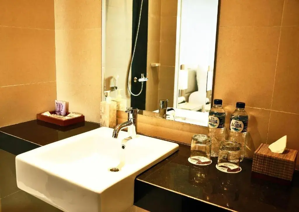 Bathroom in The Evitel Resort Ubud Bathroom in The Evitel Resort Ubud