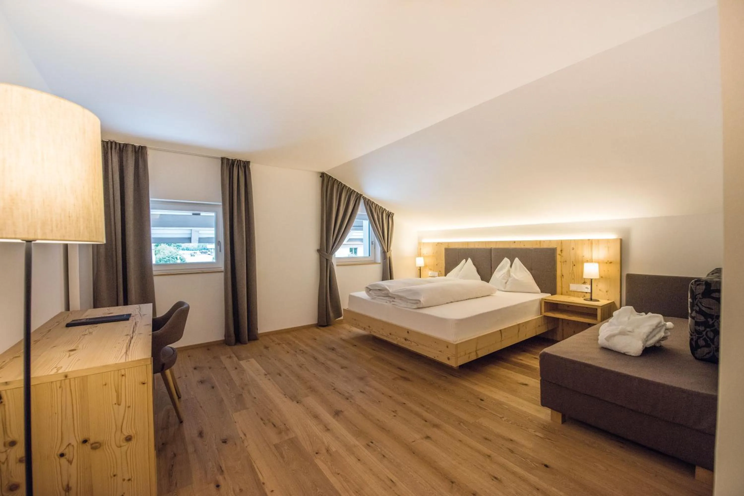Bed in Hotel Fronza - your ski & mountain home