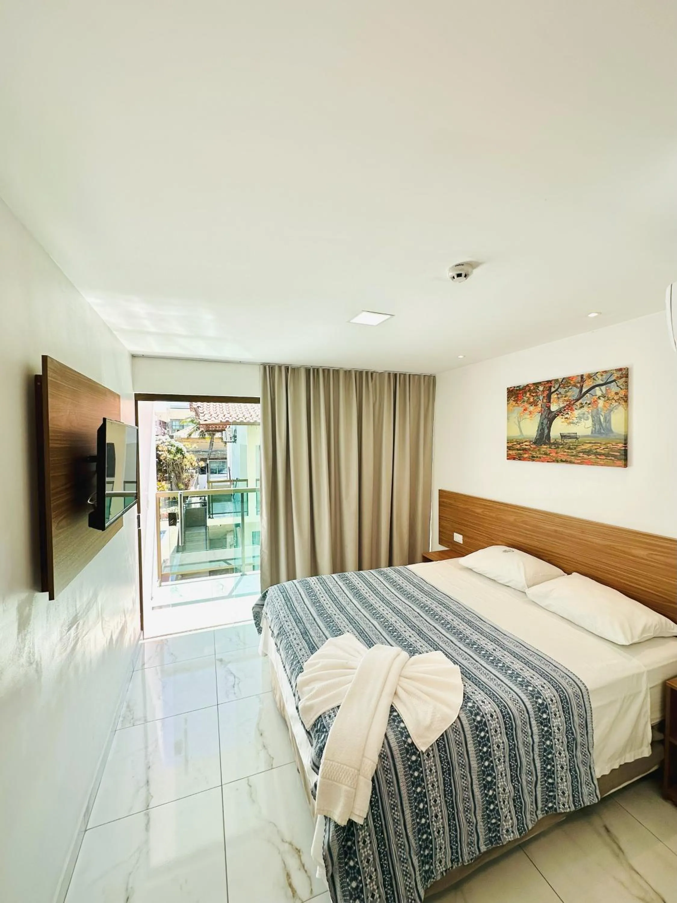 Bed in Pousada Sky Beach Flat