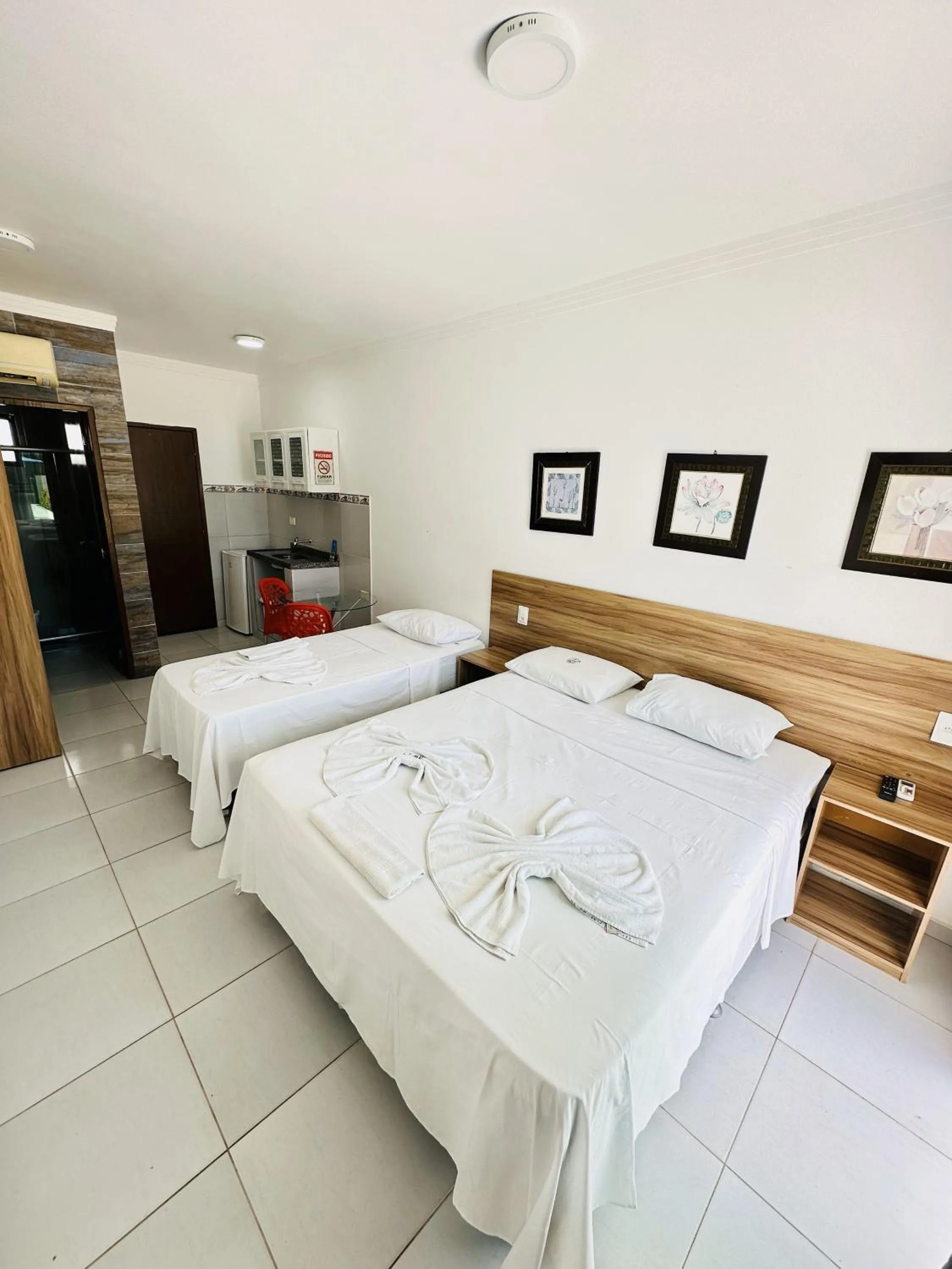 Bed in Pousada Sky Beach Flat