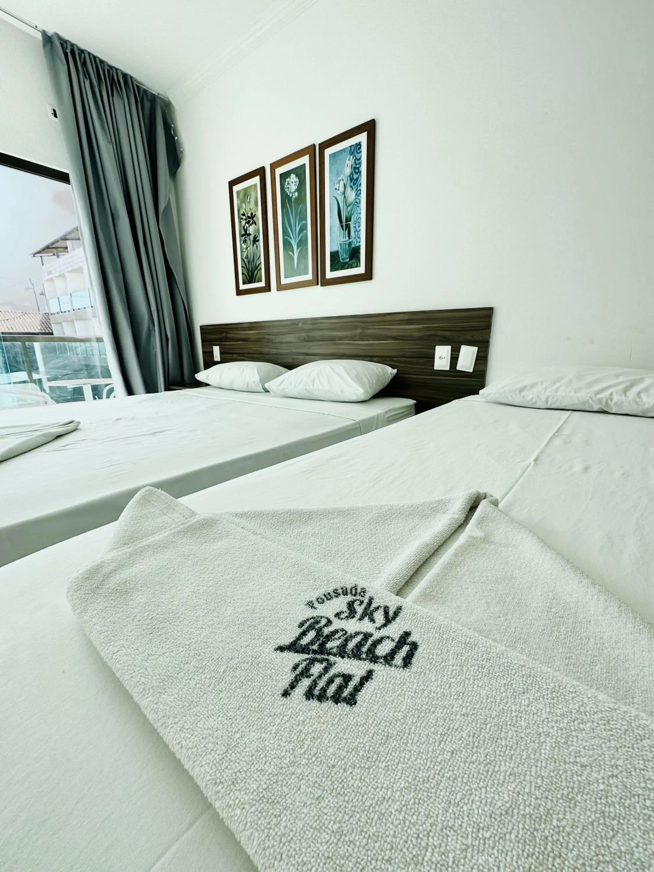 Bed in Pousada Sky Beach Flat