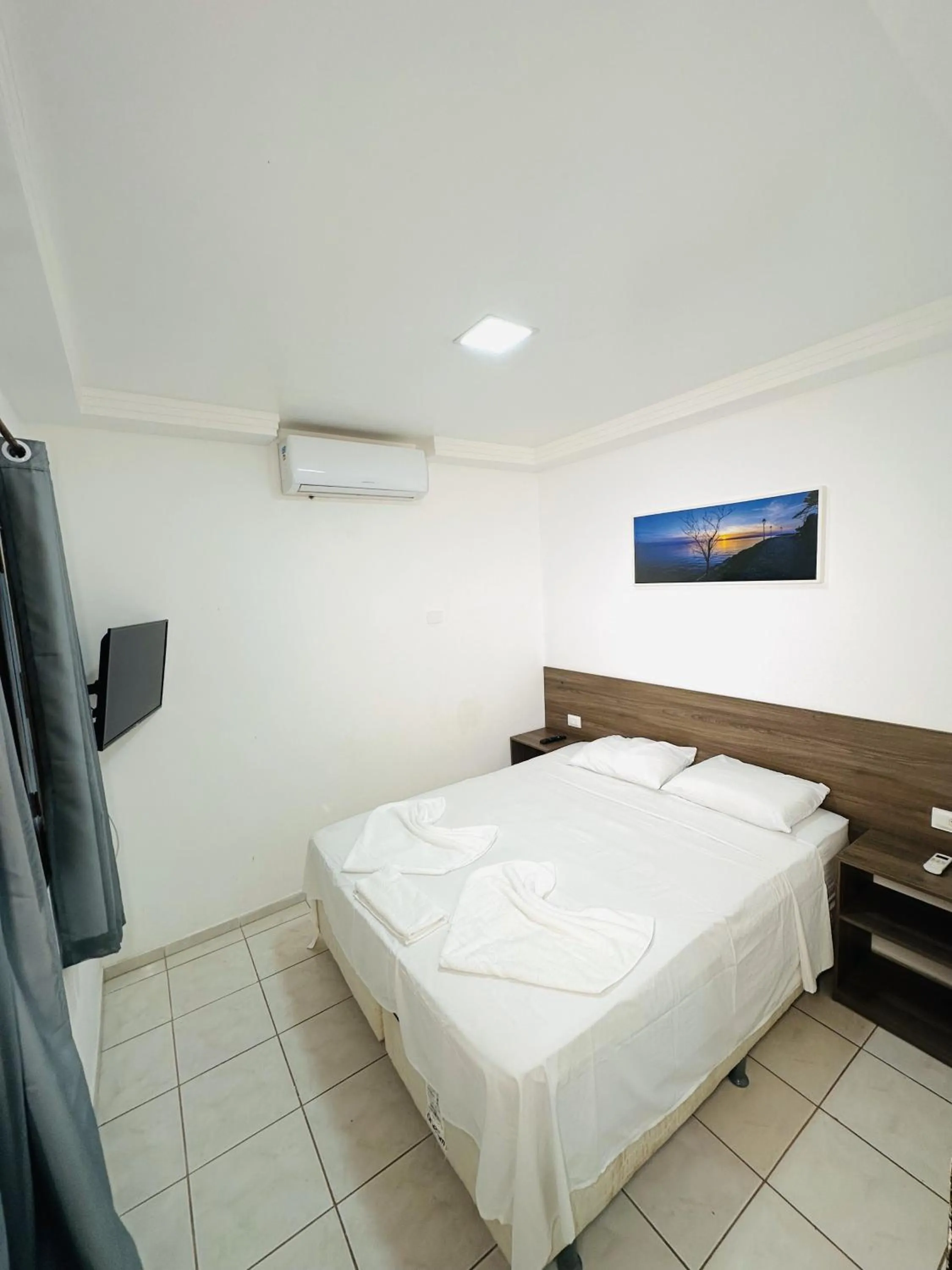 Bed in Pousada Sky Beach Flat