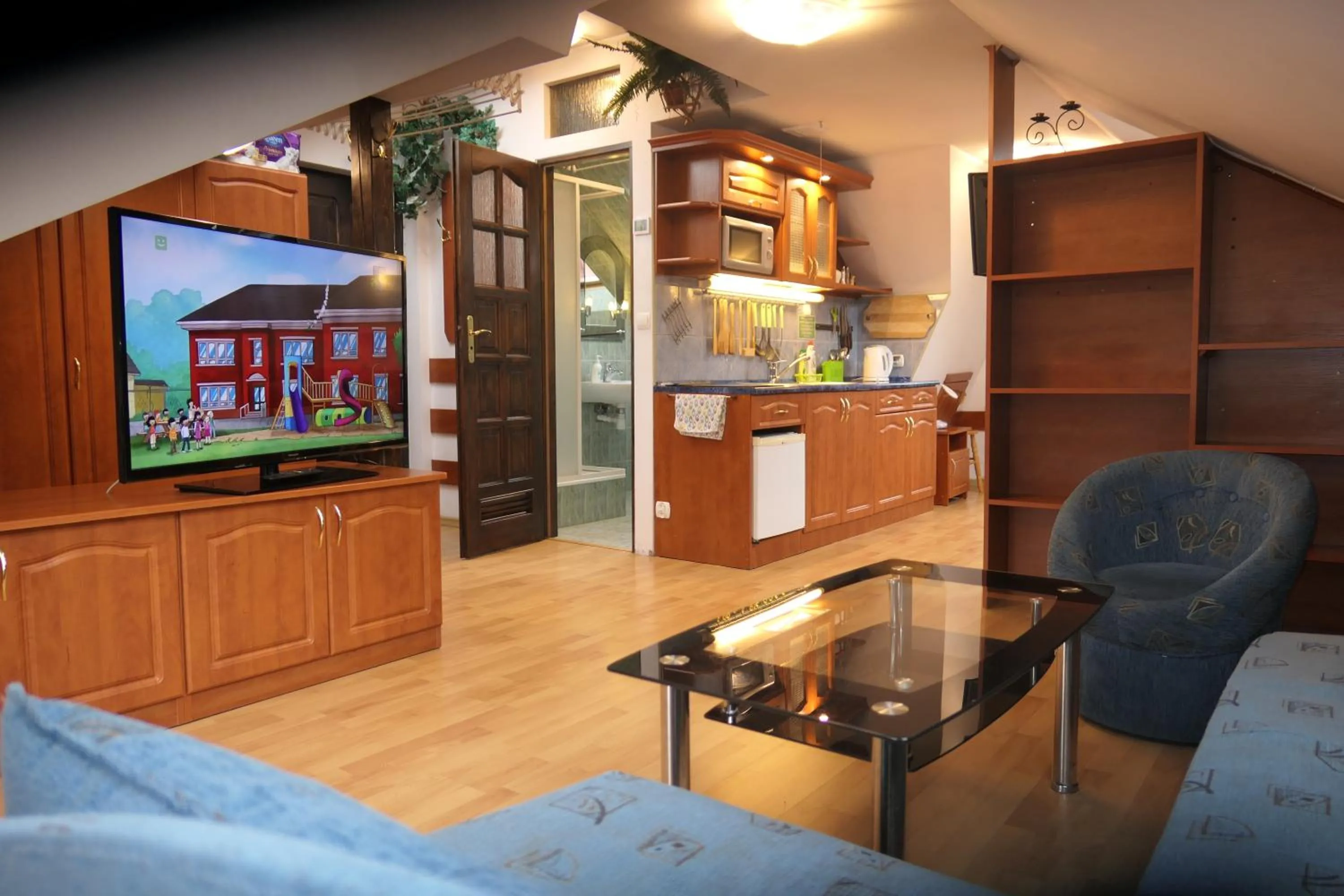 Kitchen or kitchenette in Apartamenty u Łukasza