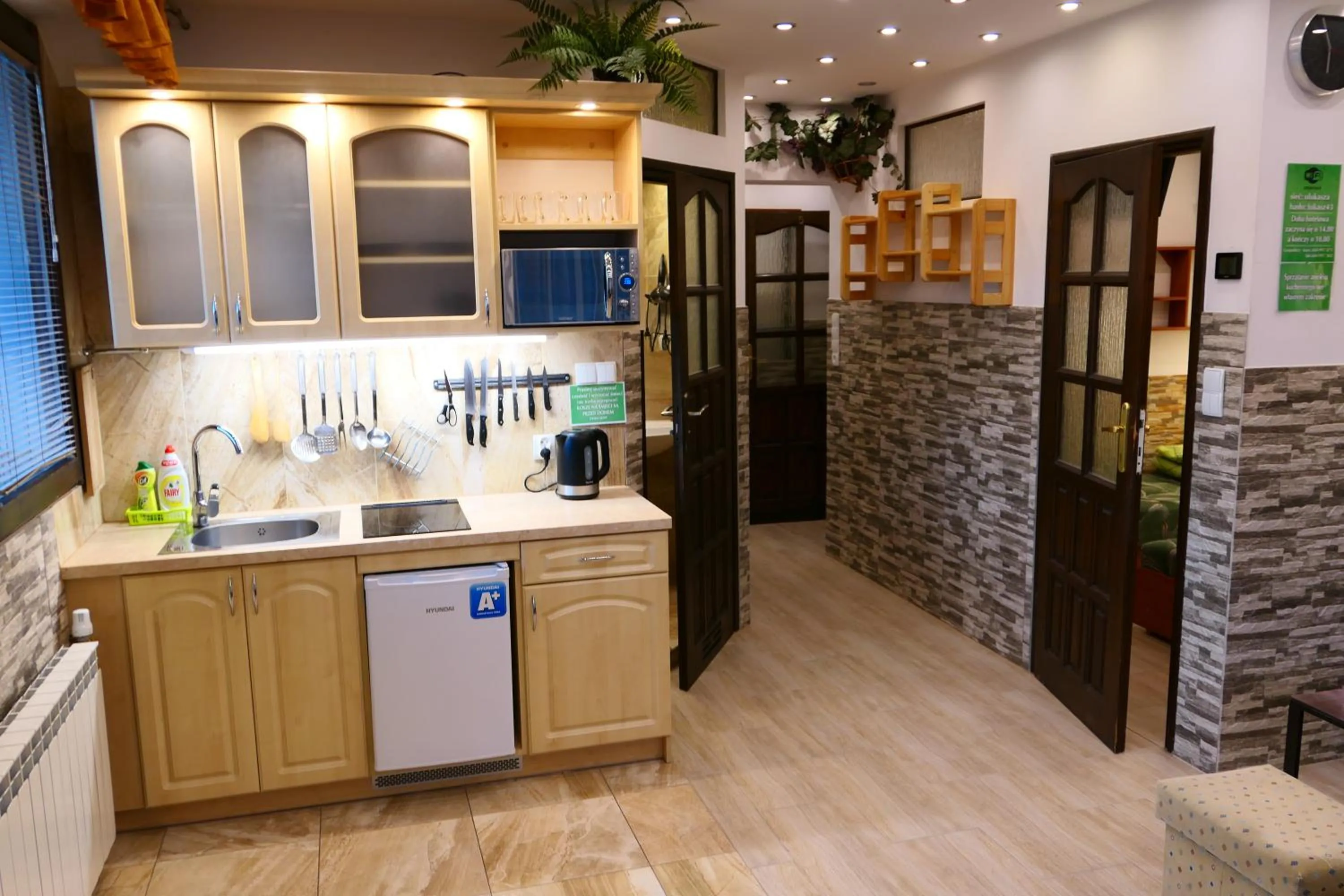 Kitchen or kitchenette in Apartamenty u Łukasza