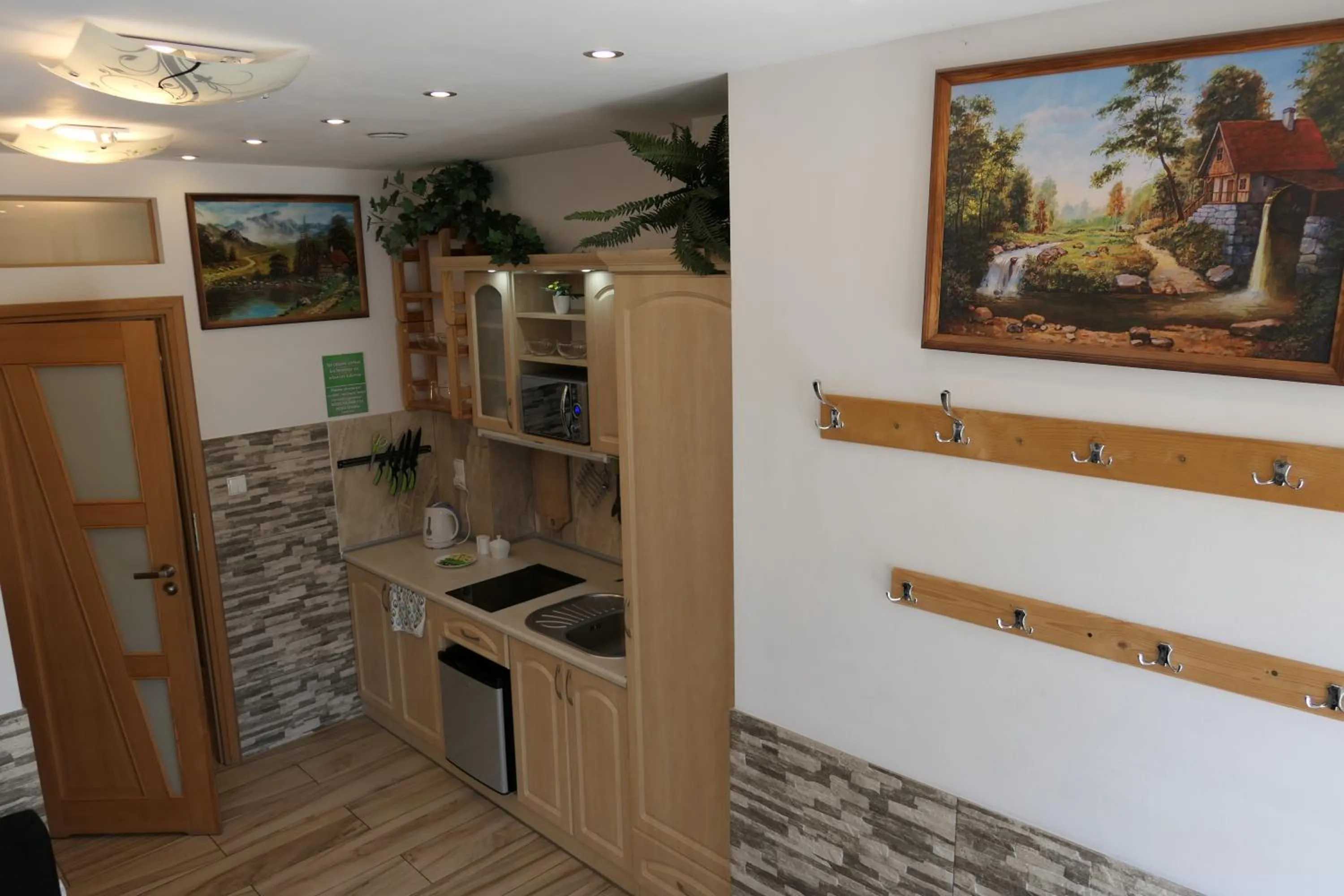 Kitchen or kitchenette in Apartamenty u Łukasza