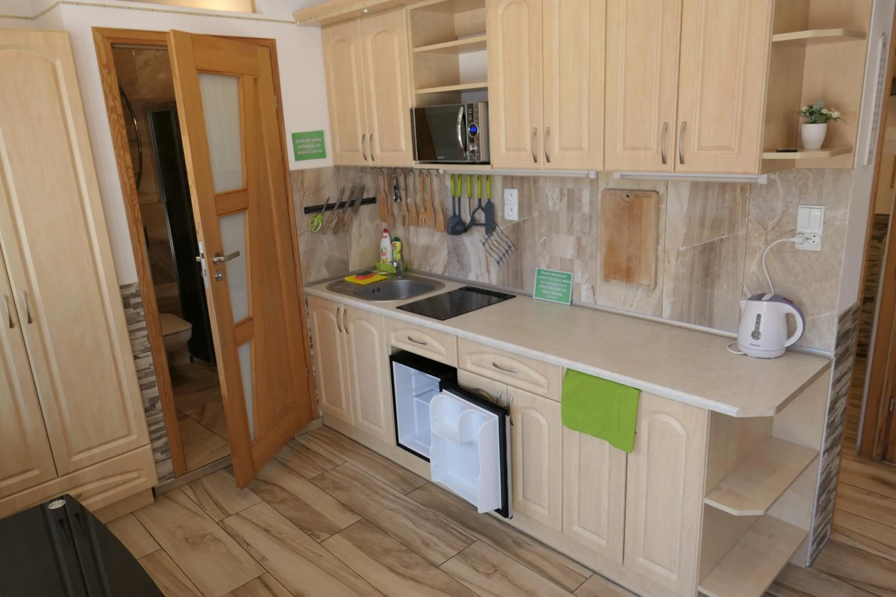 Kitchen or kitchenette in Apartamenty u Łukasza