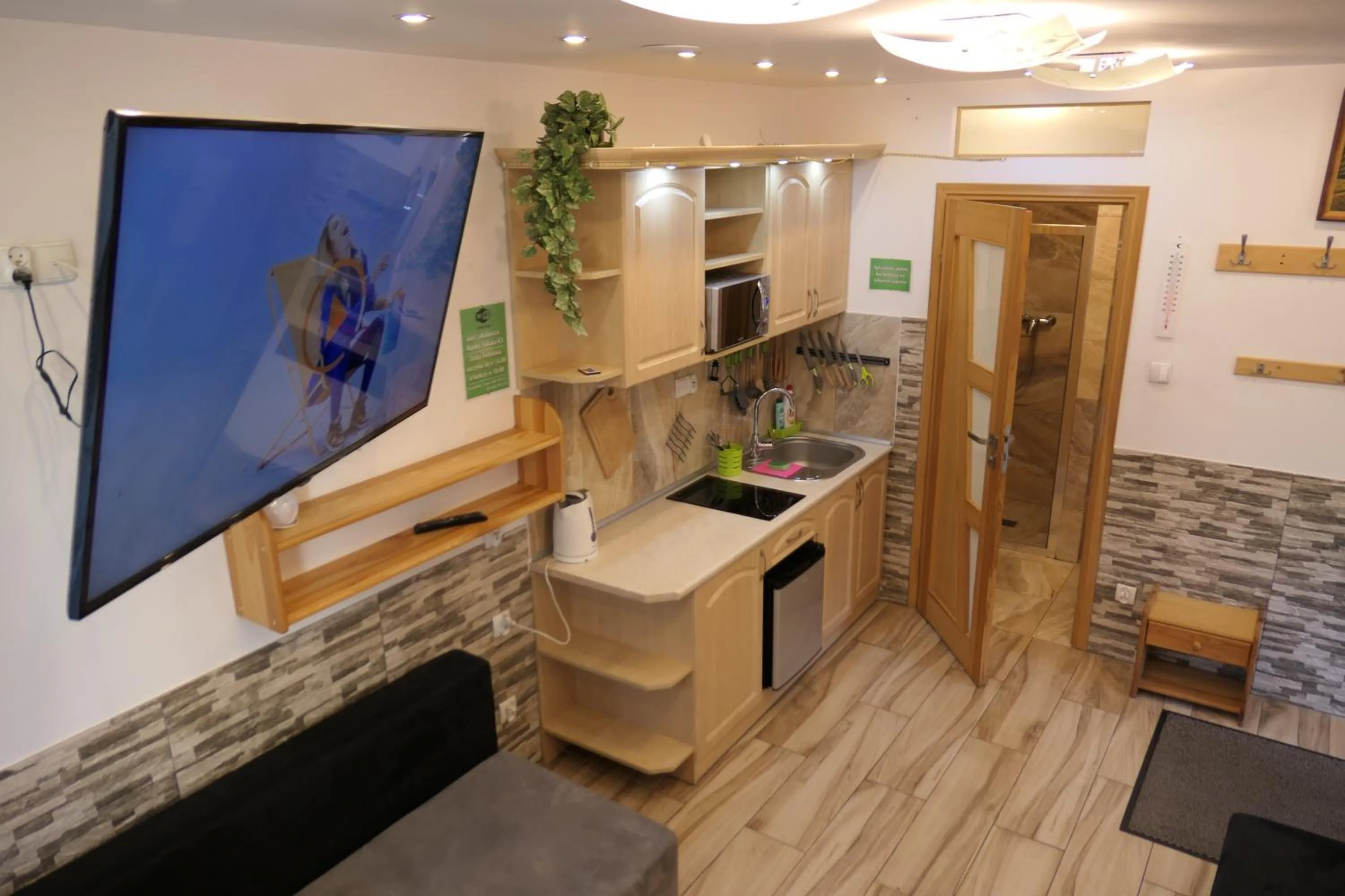 Kitchen or kitchenette in Apartamenty u Łukasza