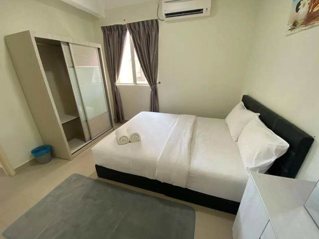 Bed in Tiara Desaru Seaview Residence