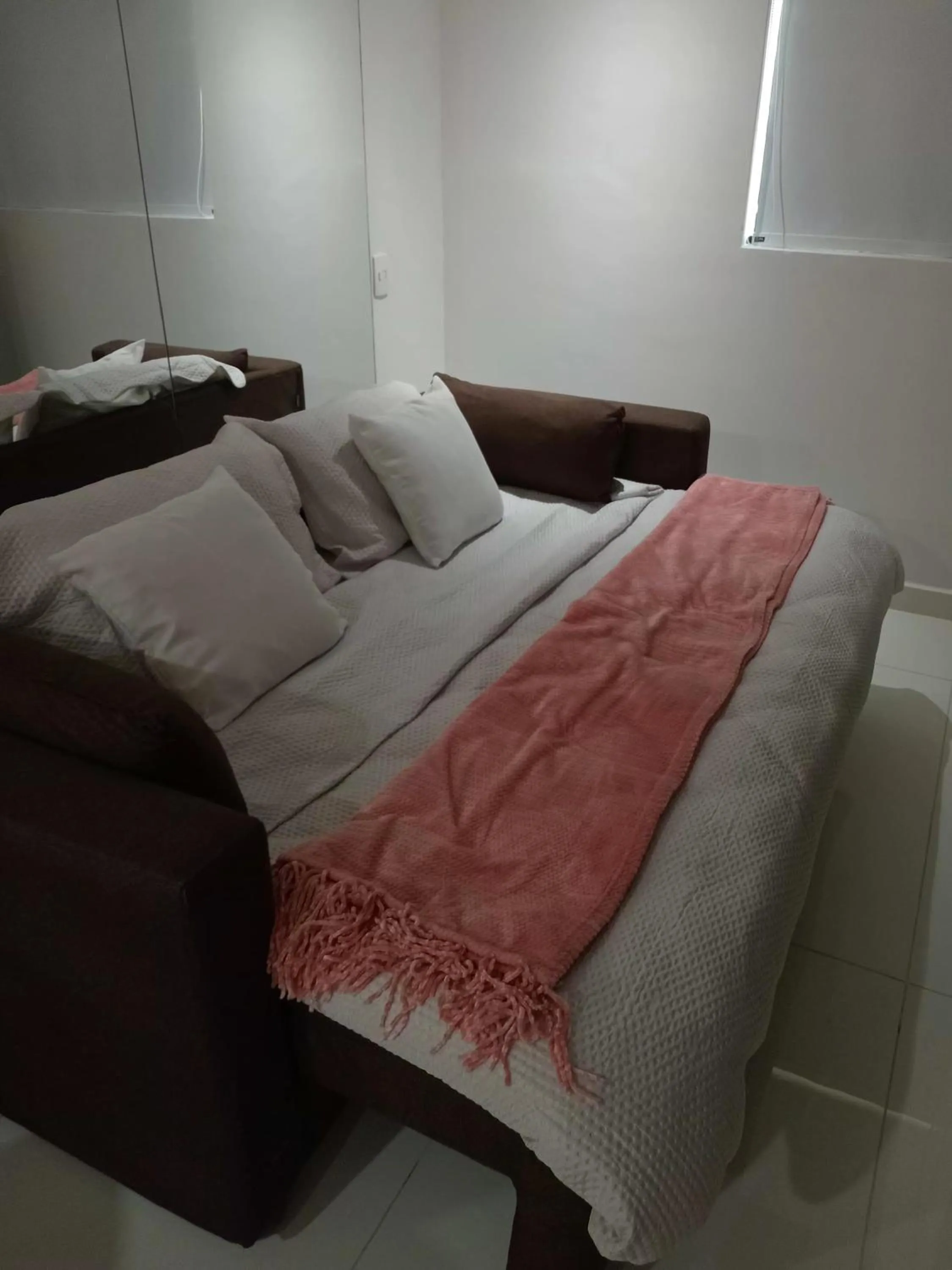 Bed in Tropical Executive Hotel