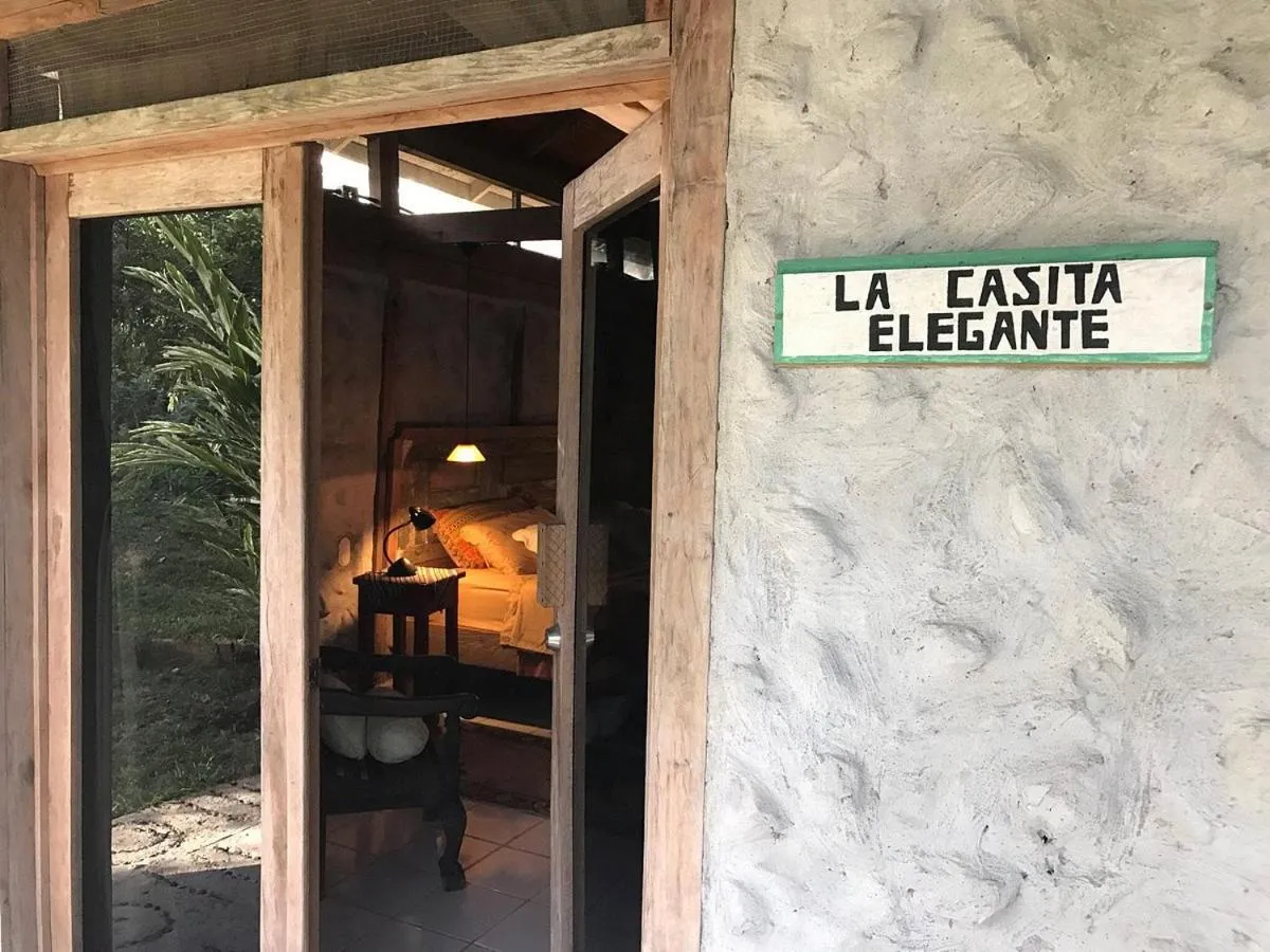 Property logo or sign in Tortugal Boutique River Lodge