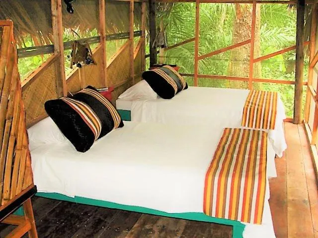 Property building, Bed in Tortugal Boutique River Lodge