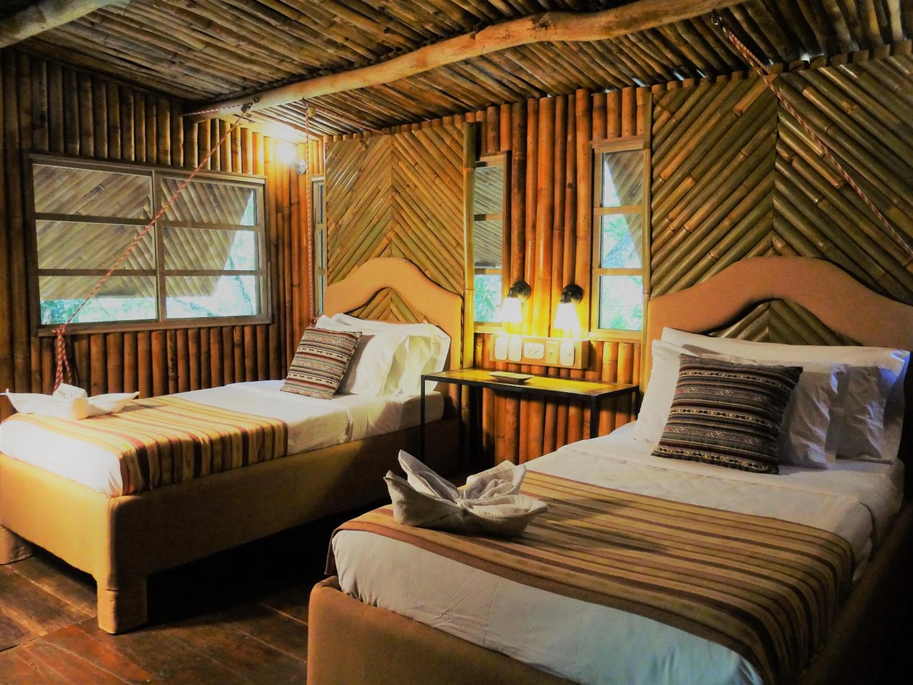 Bed in Tortugal Boutique River Lodge