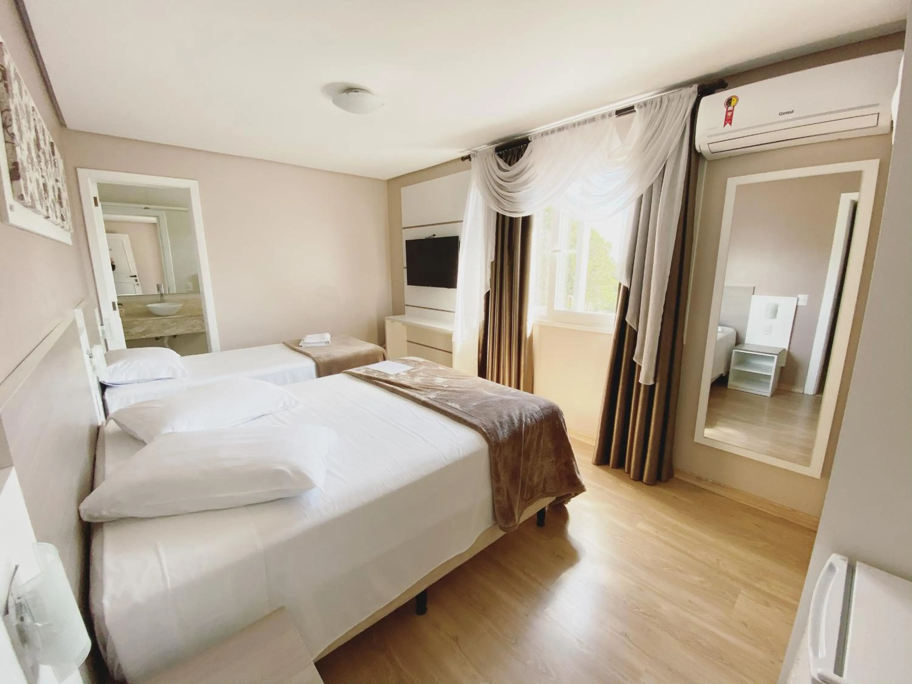 Bed in Pousada Vovô Nino