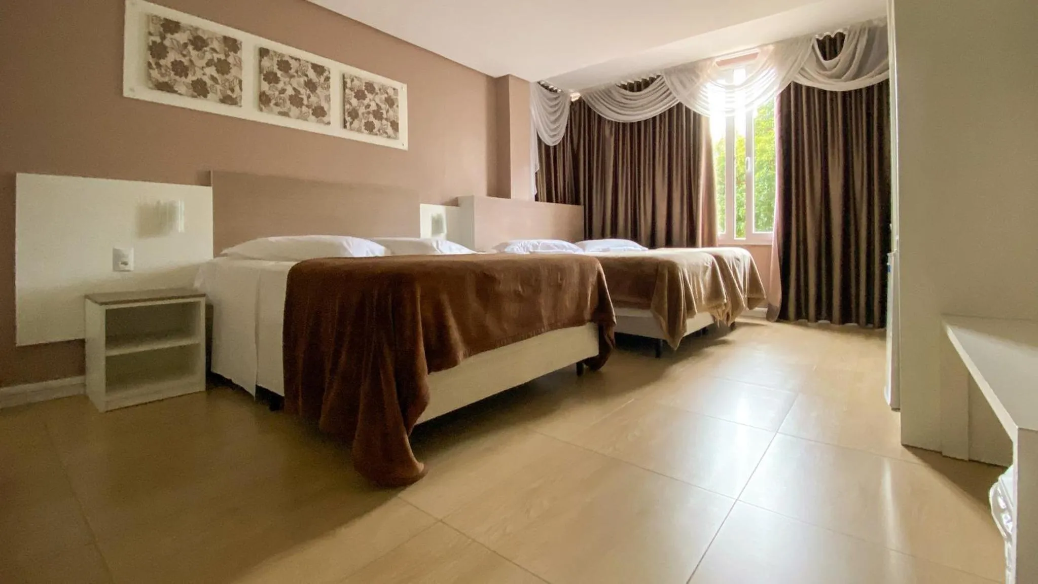 Bed in Pousada Vovô Nino