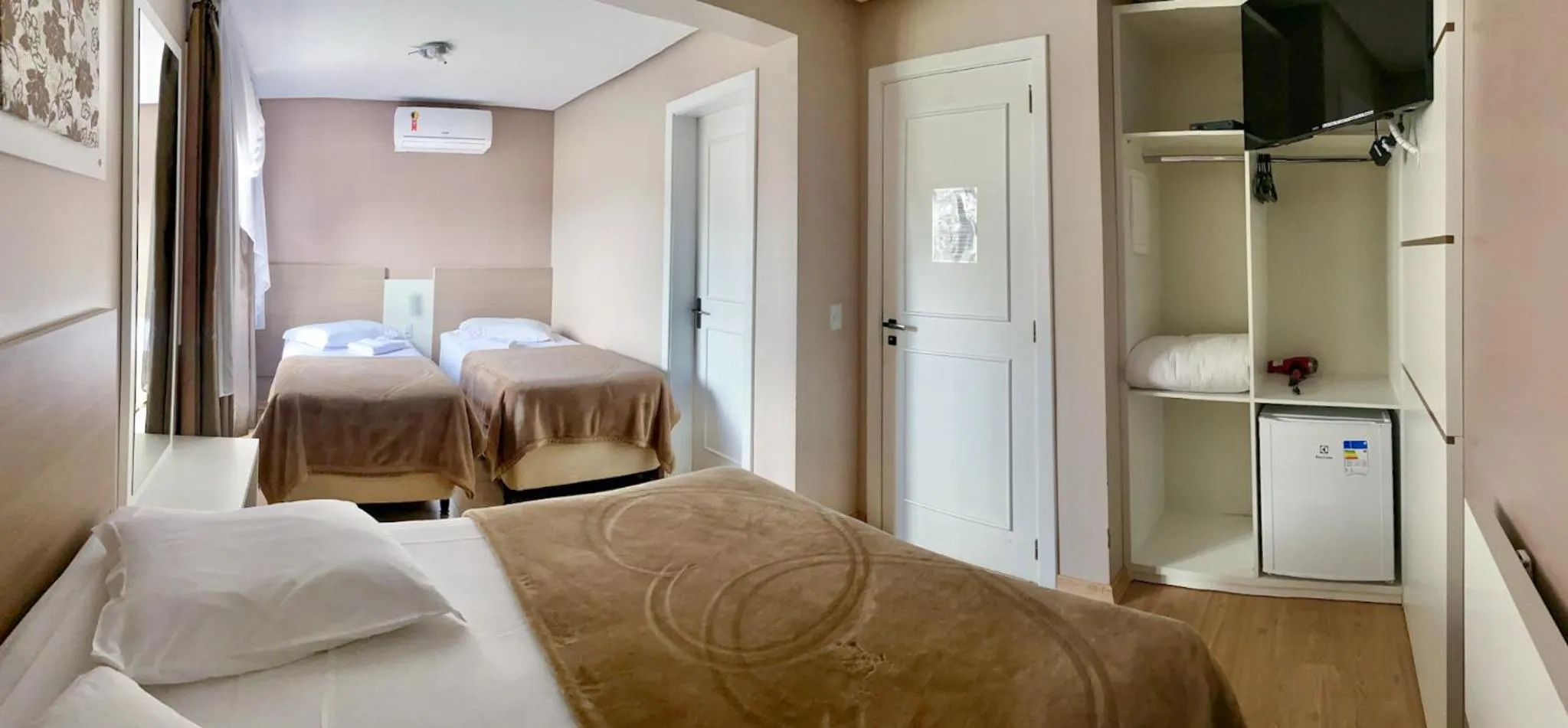 Bed in Pousada Vovô Nino