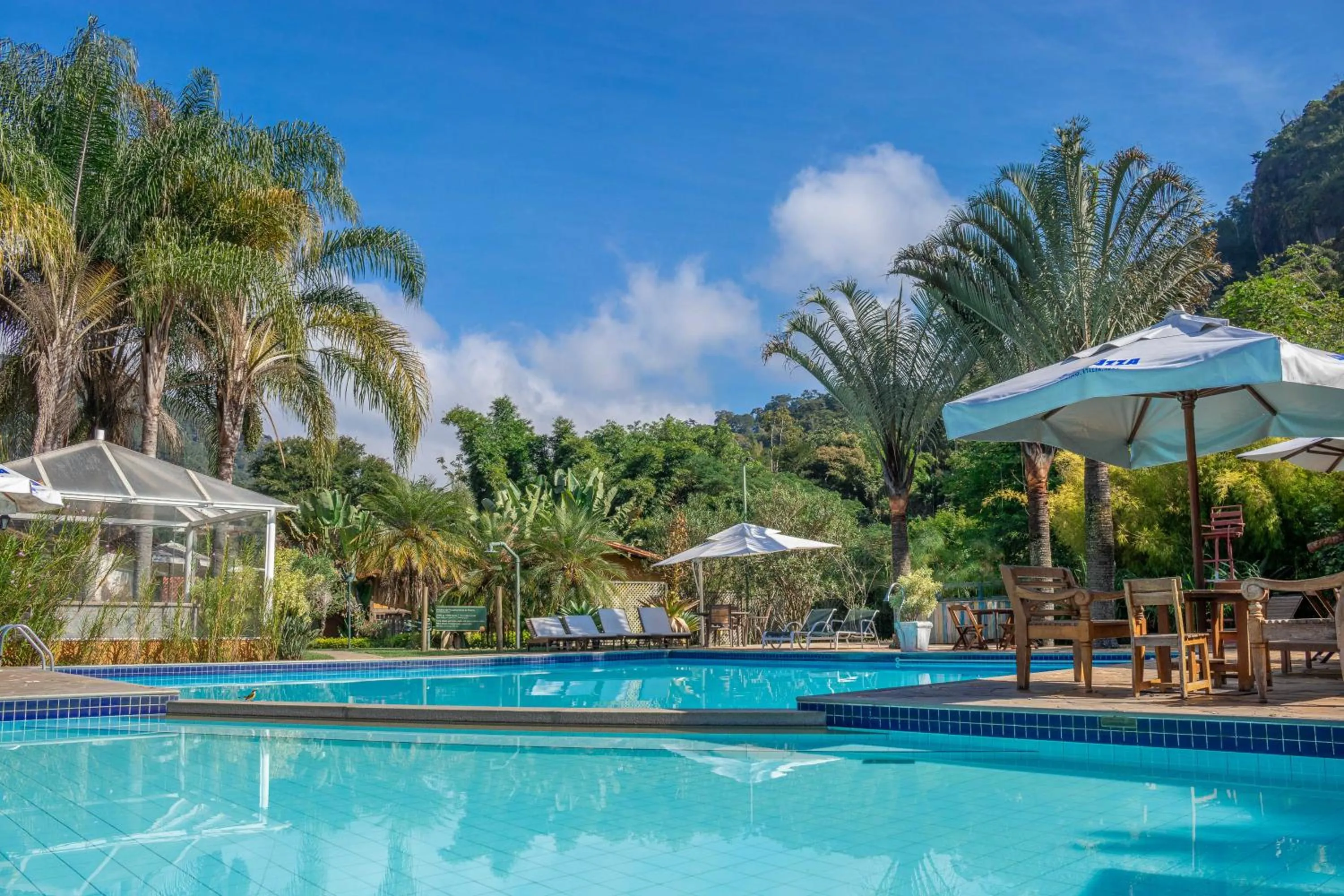 Swimming pool in Bomtempo Itaipava Hotel by Castelo Itaipava