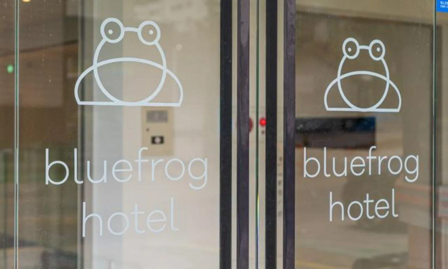 Property logo or sign in Bluefrog Hotel
