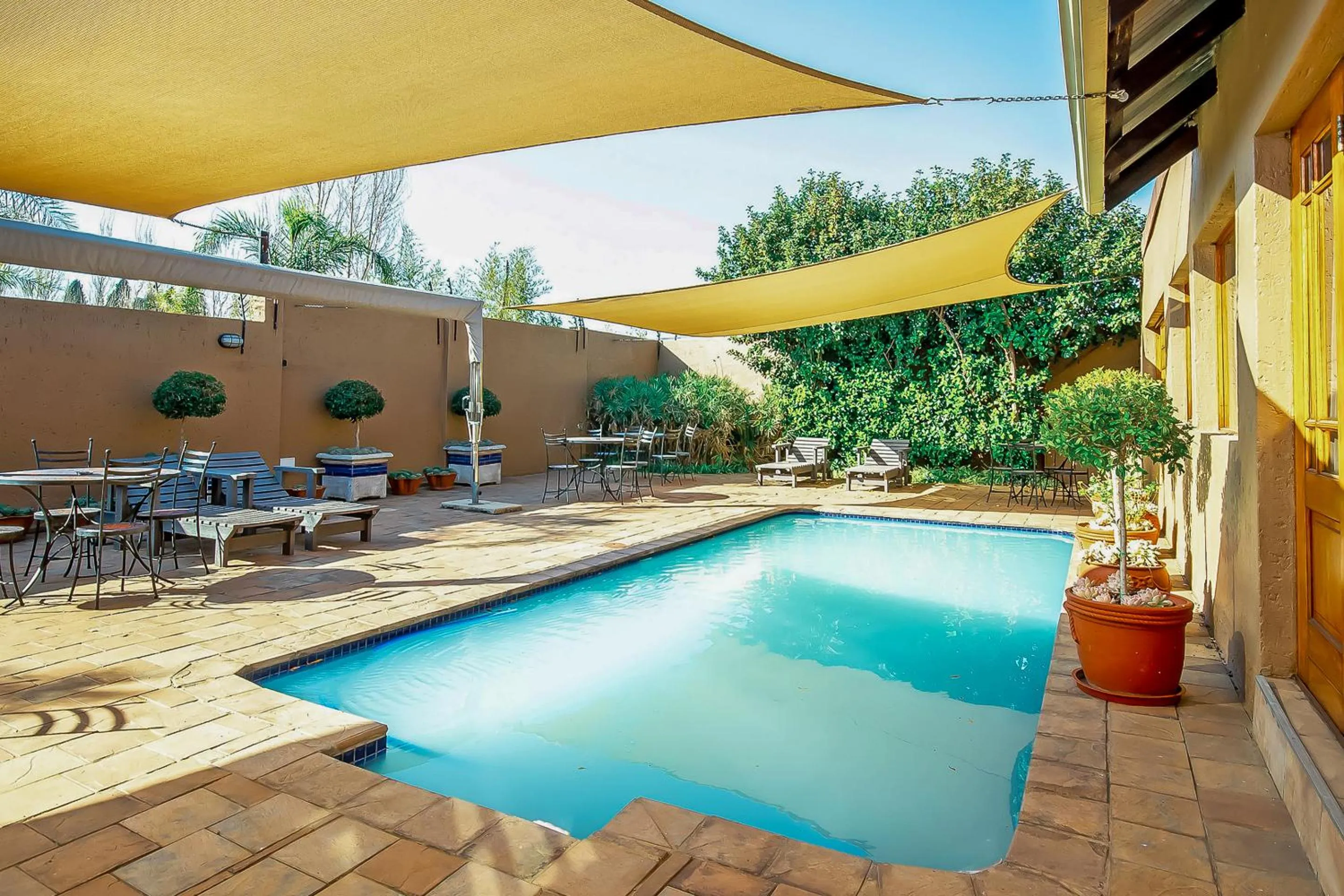 Swimming pool in Afrique Boutique Hotel O.R. Tambo