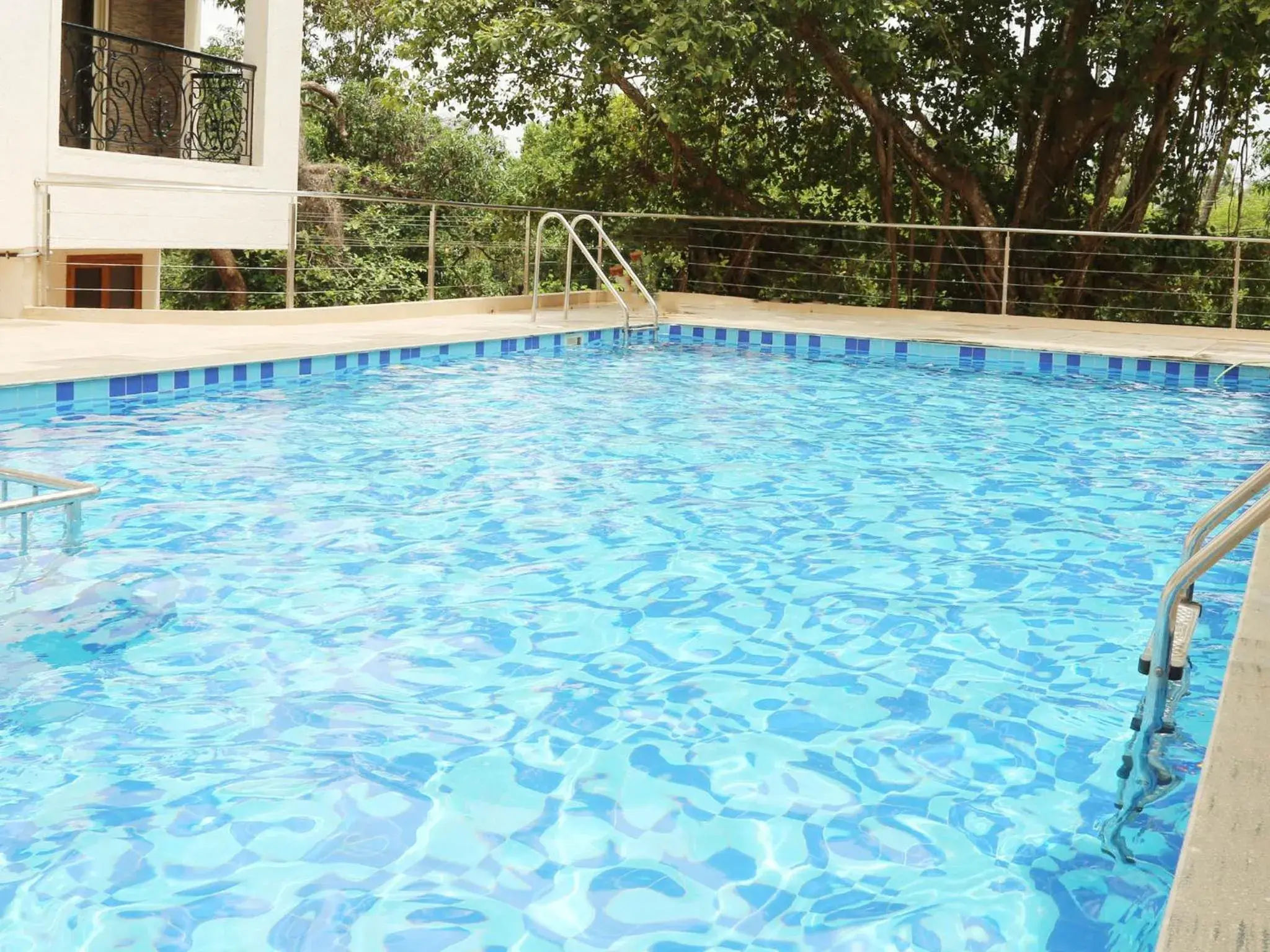 Swimming pool in La Vida Studio Inn Baga- Goa- By Lords Hotels and Resorts Swimming pool in La Vida Studio Inn Baga- Goa- By Lords Hotels and Resorts