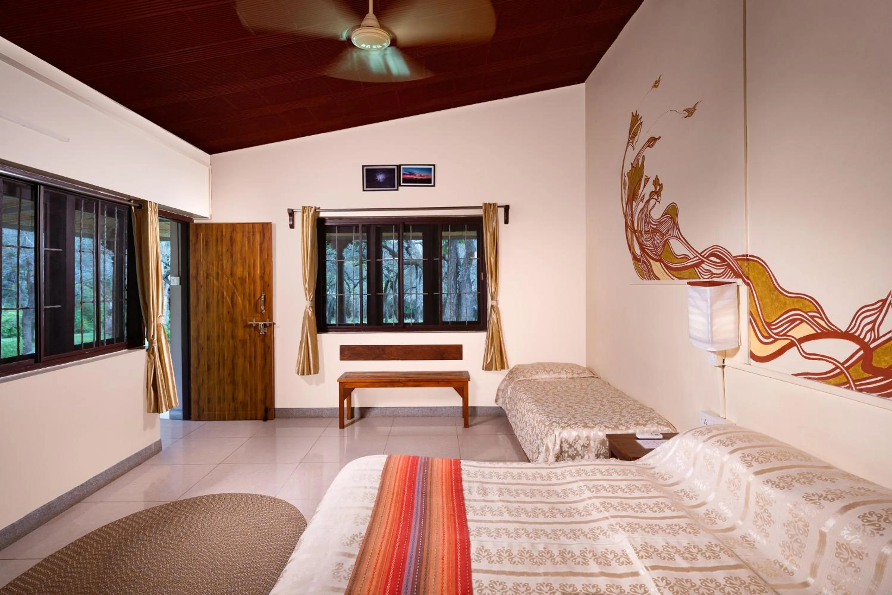 Bed in Jungle Hut Resort