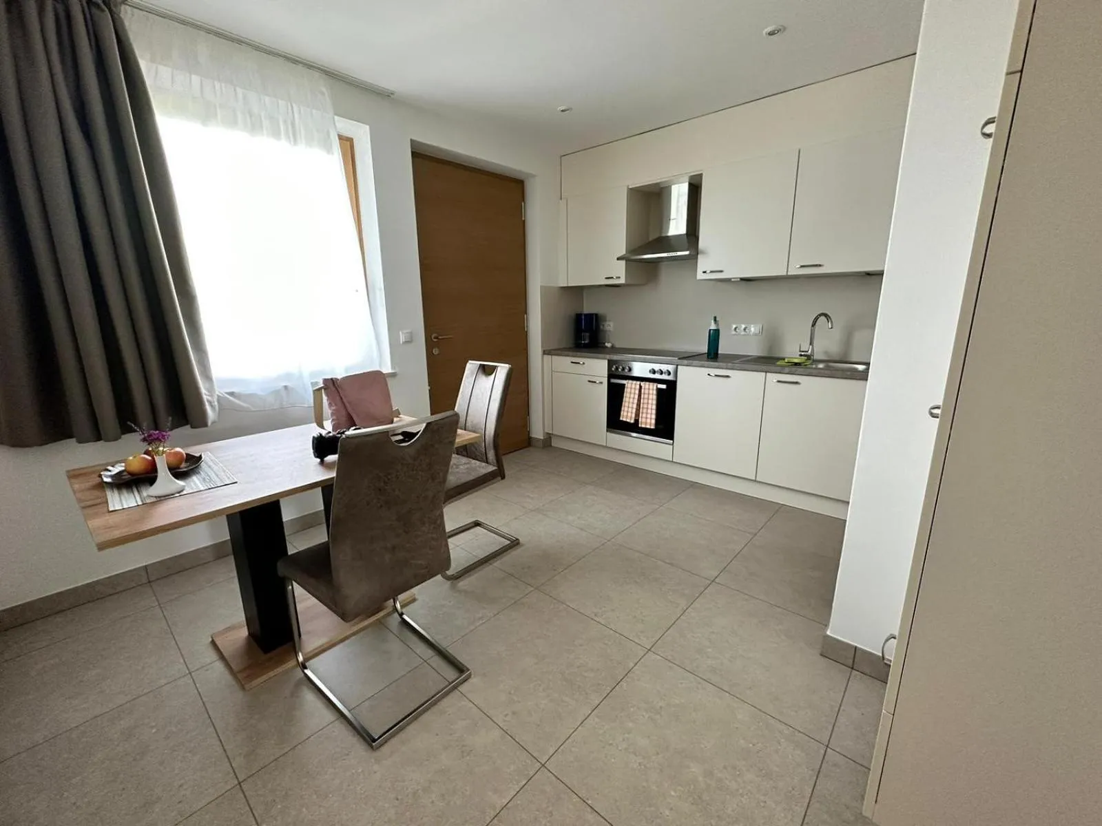 Kitchen or kitchenette in Appartements Weisshauserhof
