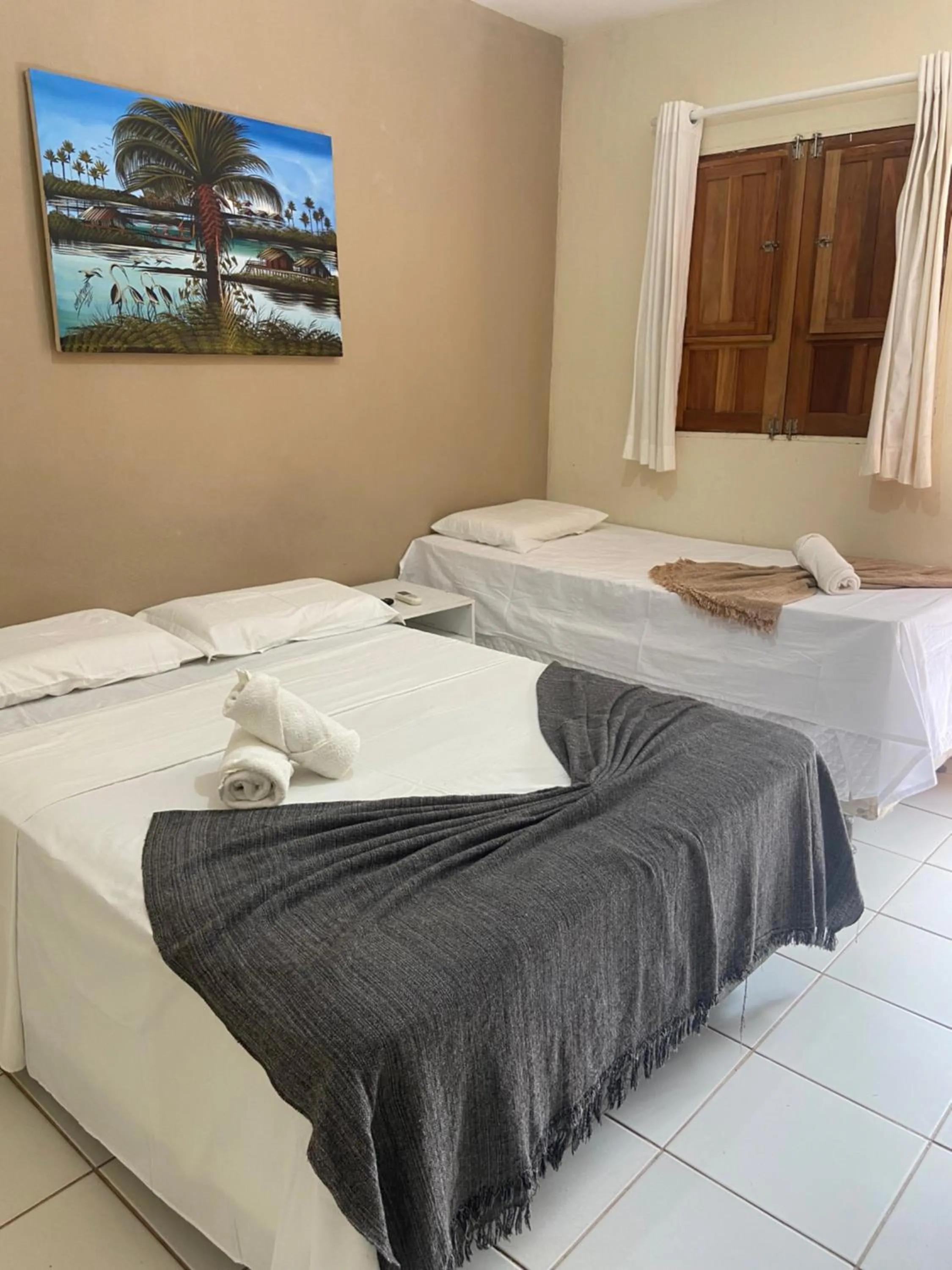 Bed in Pousada Rota Beach