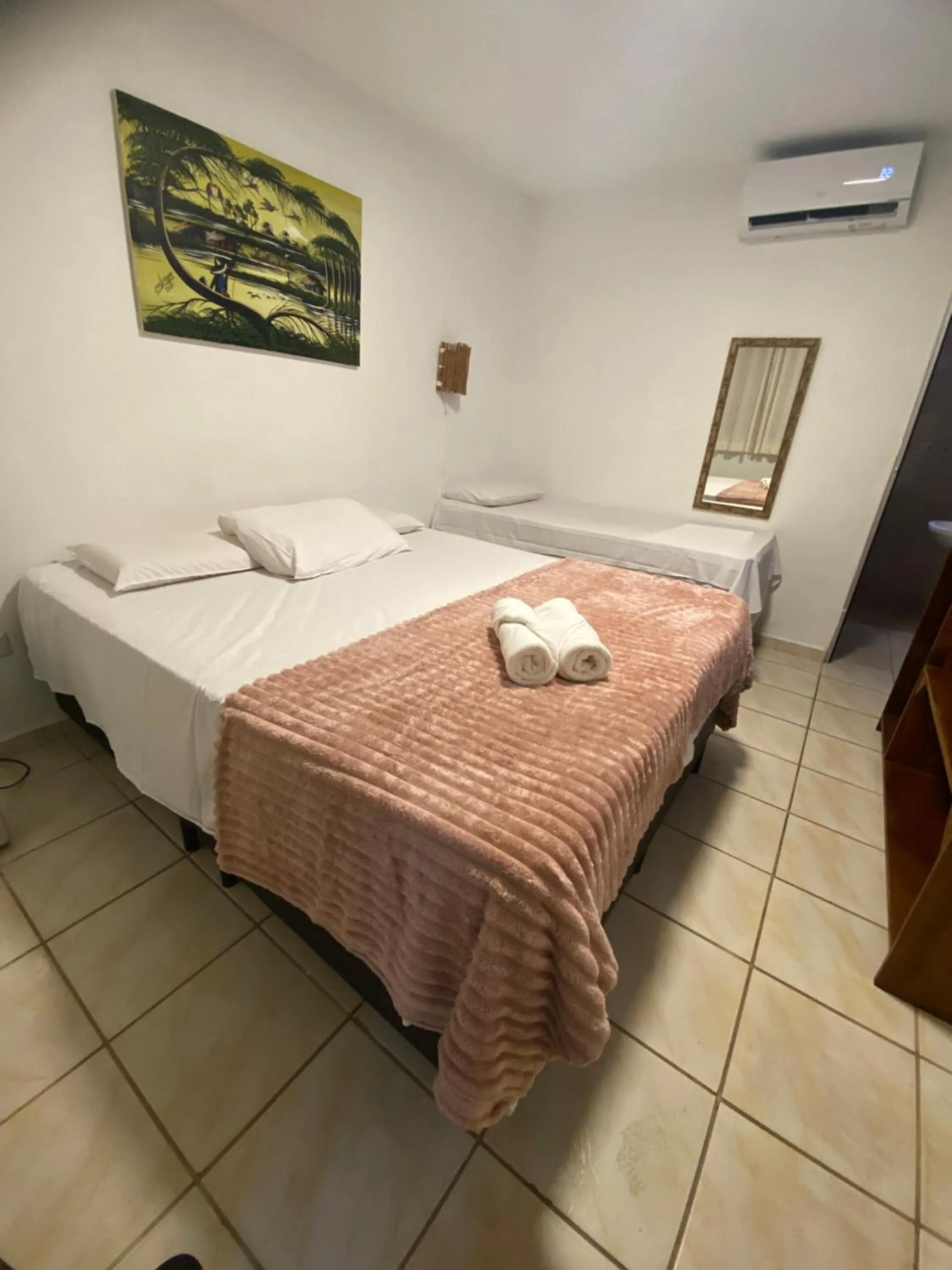 Bed in Pousada Rota Beach