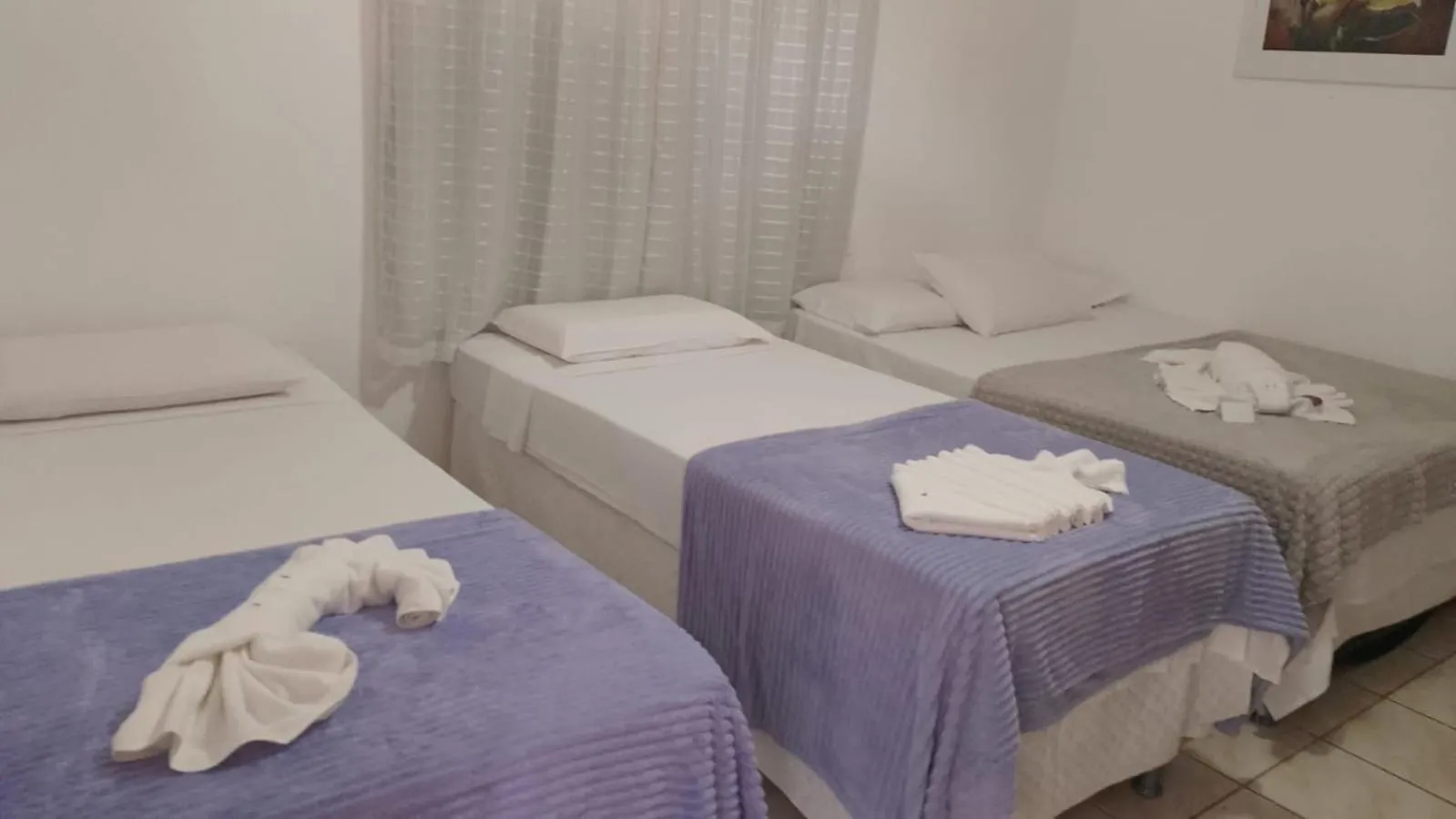 Bed in Pousada Rota Beach