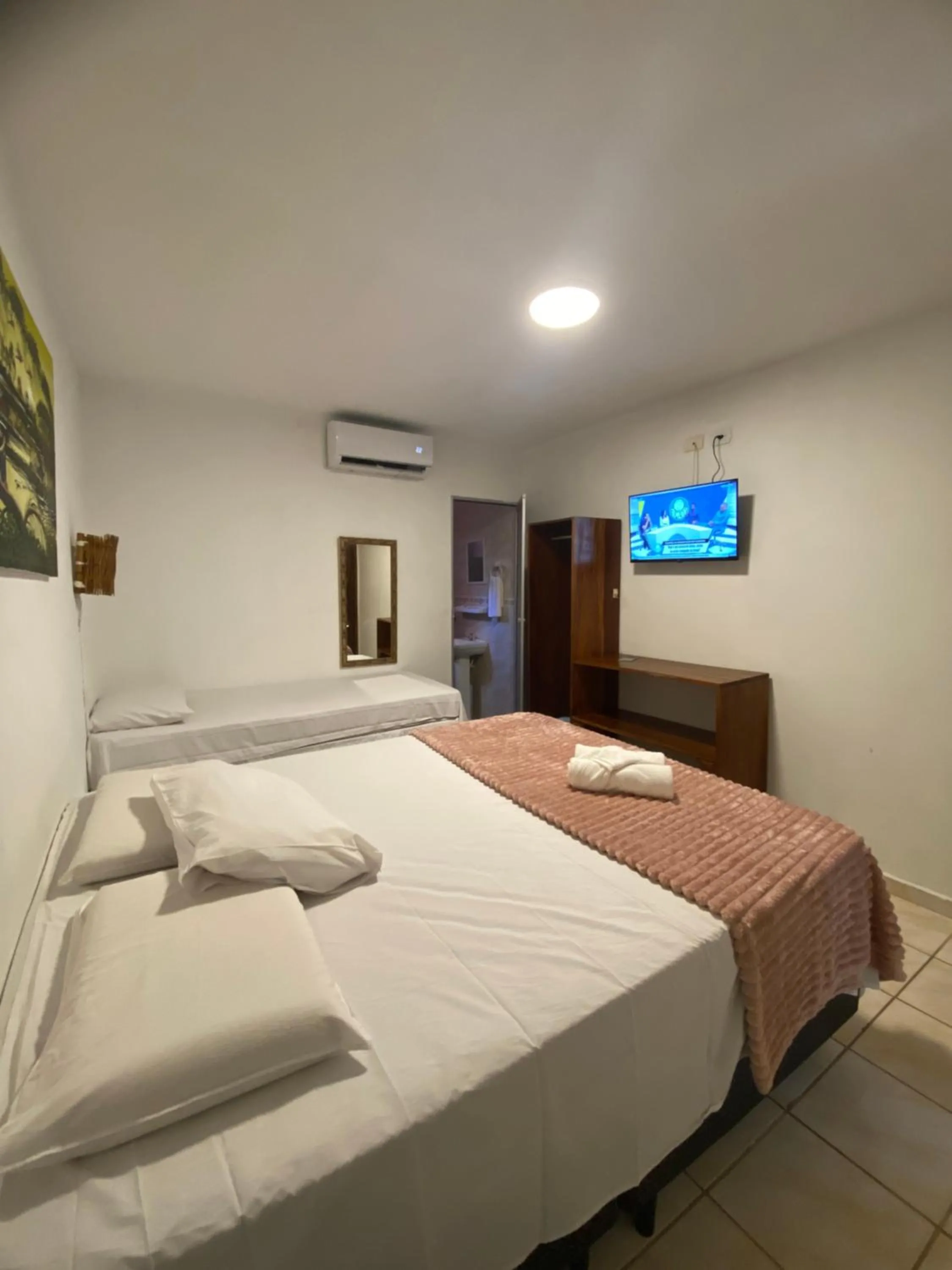 Bed in Pousada Rota Beach