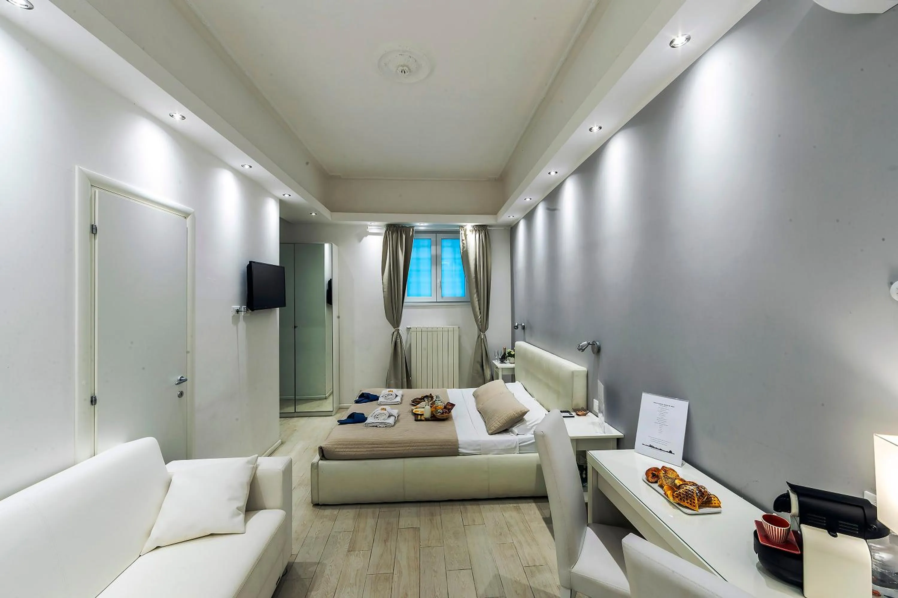 Bed in Grand Tour Rome Suites - Liberty Collection