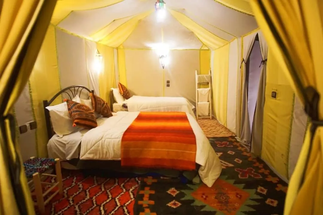 Bed in Merzouga Luxury Camp