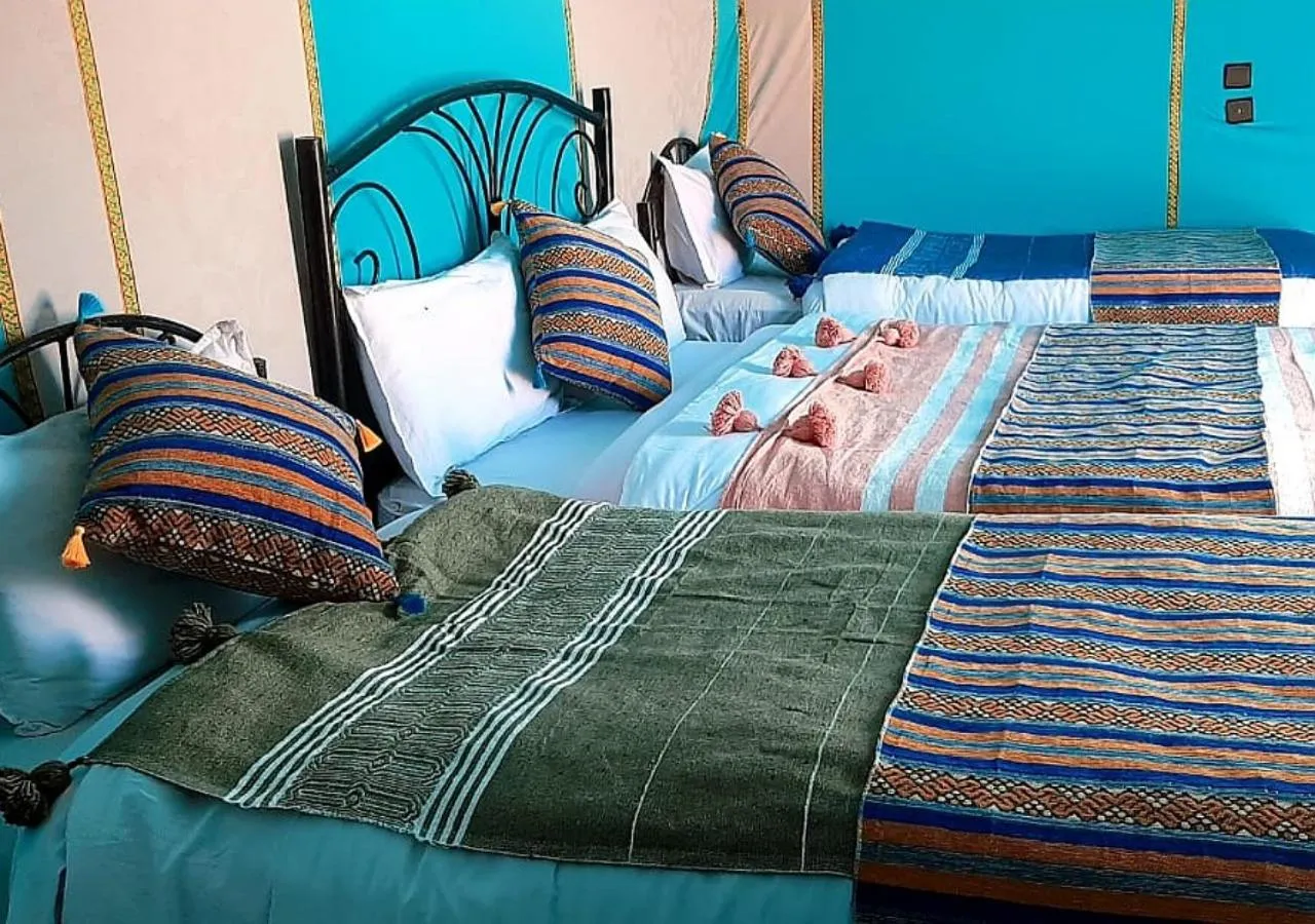 Bed in Merzouga Luxury Camp