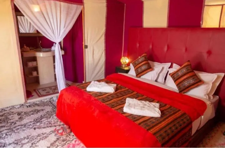 Bed in Merzouga Luxury Camp