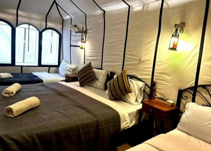 Bed in Merzouga Luxury Camp