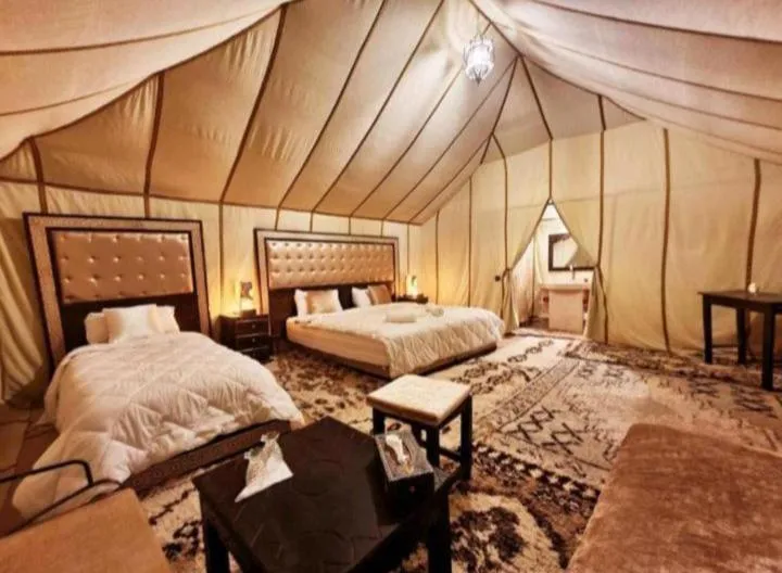 Bed in Merzouga Luxury Camp